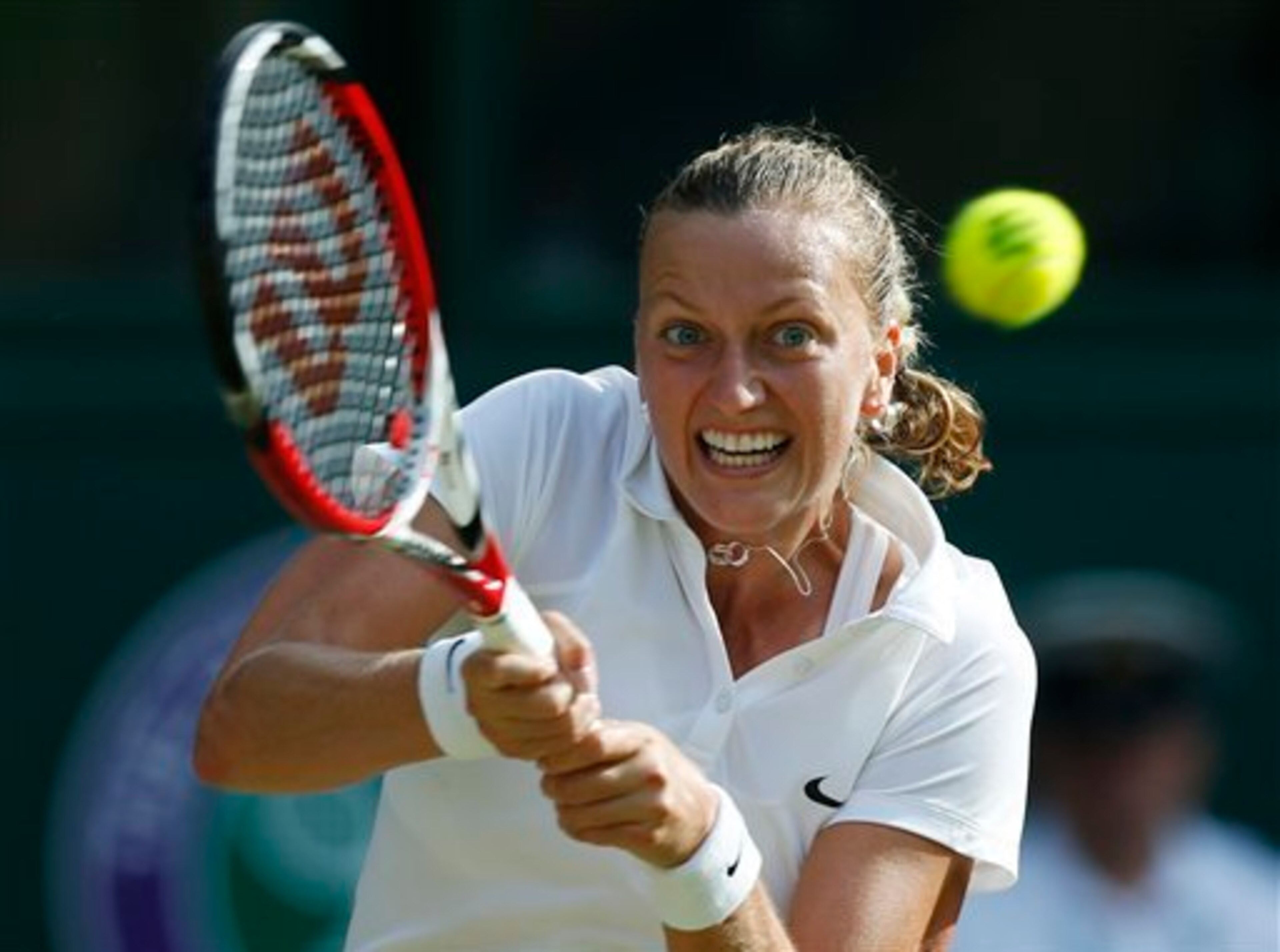 Petra Kvitova hits a backhand during a three-set match against Venus Williams. Petra Kvitova hits a backhand during a three-set match against Venus Williams.