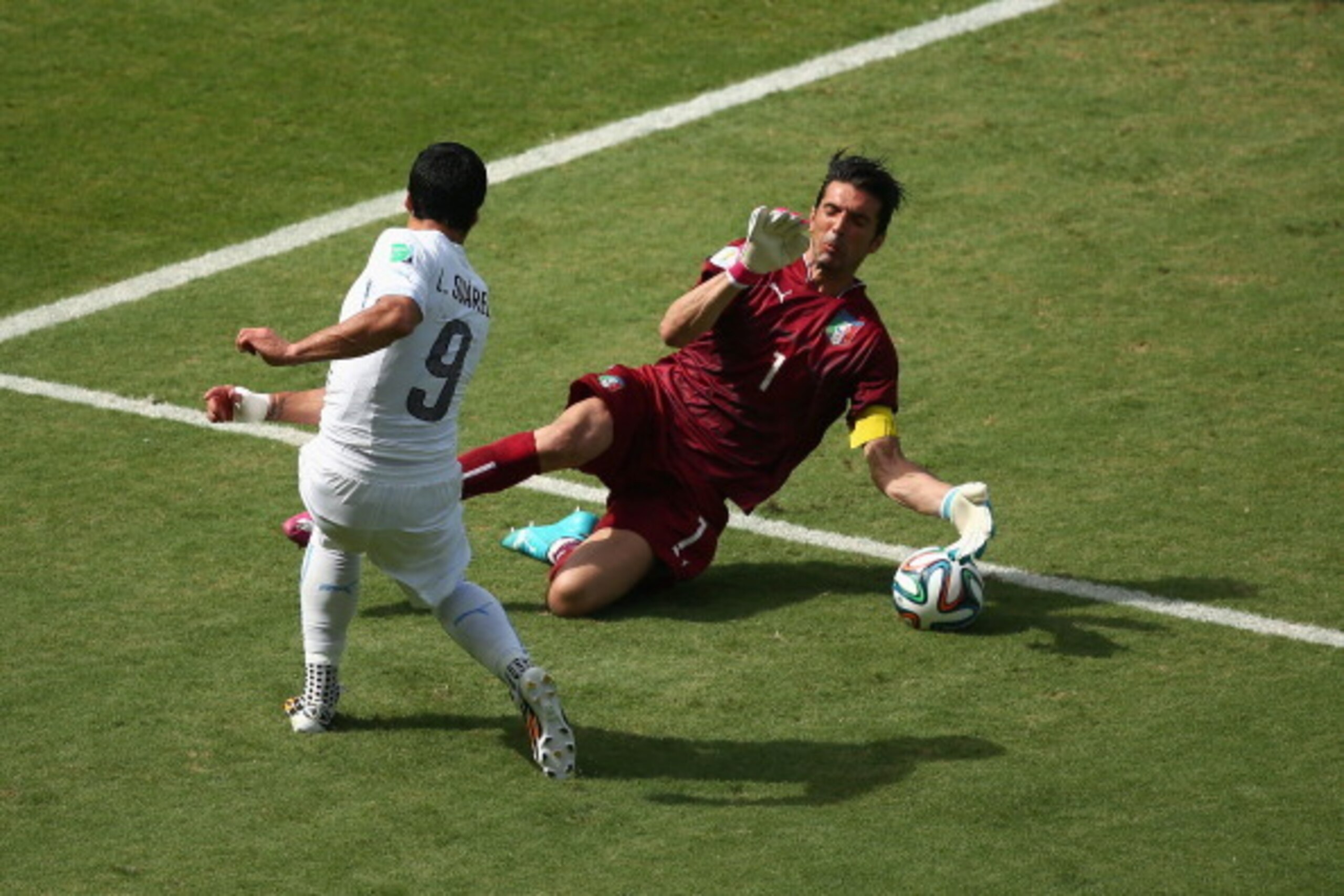 Gigi Buffon denies Luis Suarez in the first half of Italy's clash with Uruguay.