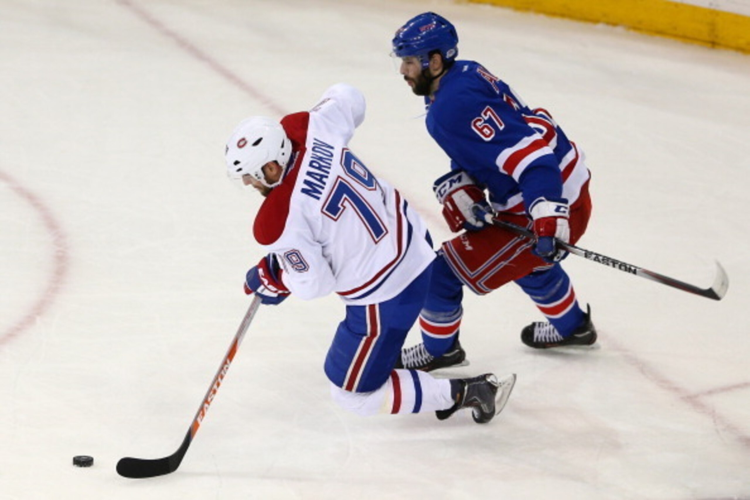 Markov and New York Rangers forward Benoit Pouliot. Markov and New York Rangers forward Benoit Pouliot.