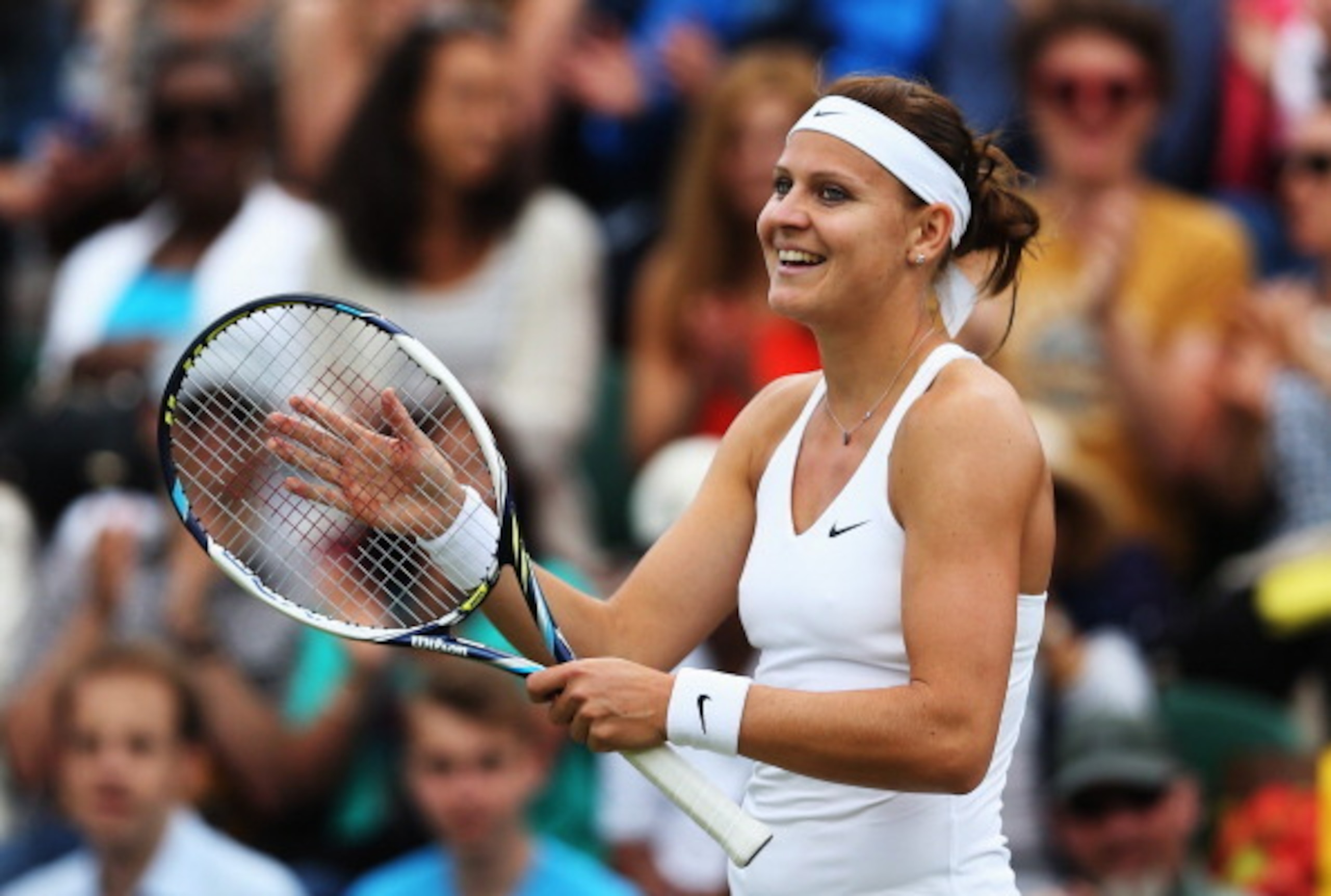 Lucie Safarova celebrates her third-round win at Wimbledon. Lucie Safarova celebrates her third-round win at Wimbledon.