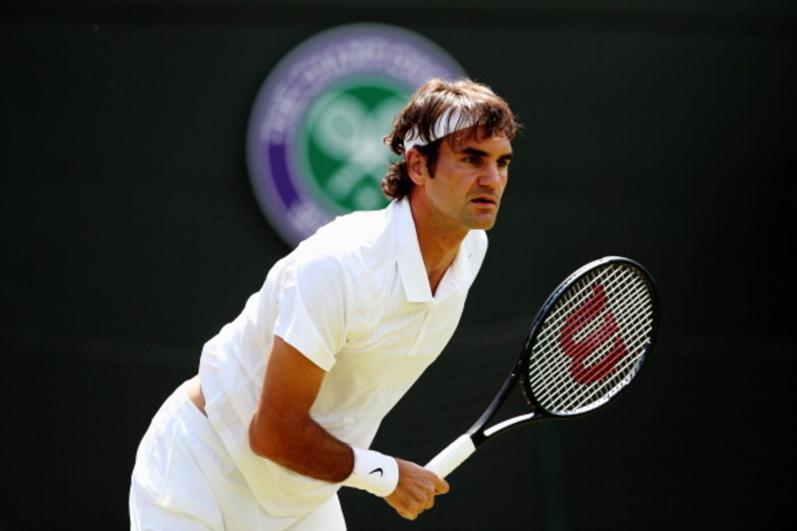 Roger Federer during quarterfinal match at Wimbledon.