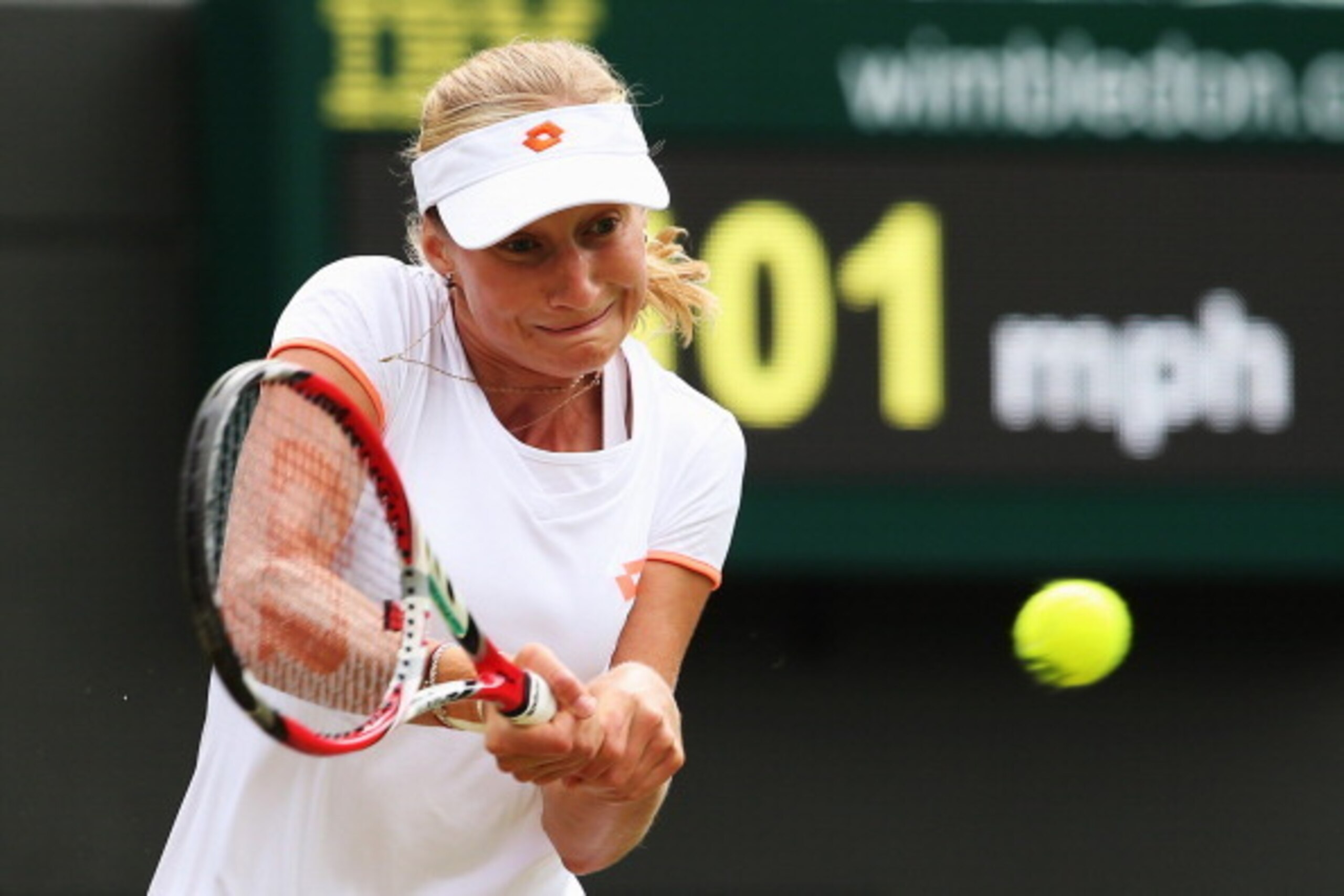 Ekaterina Makarova prepares to hit the ball during a quarterfinal match at Wimbledon.