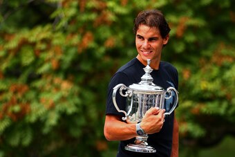 Rafael Nadal poses with U.S. Open trophy after winning the title in 2013.