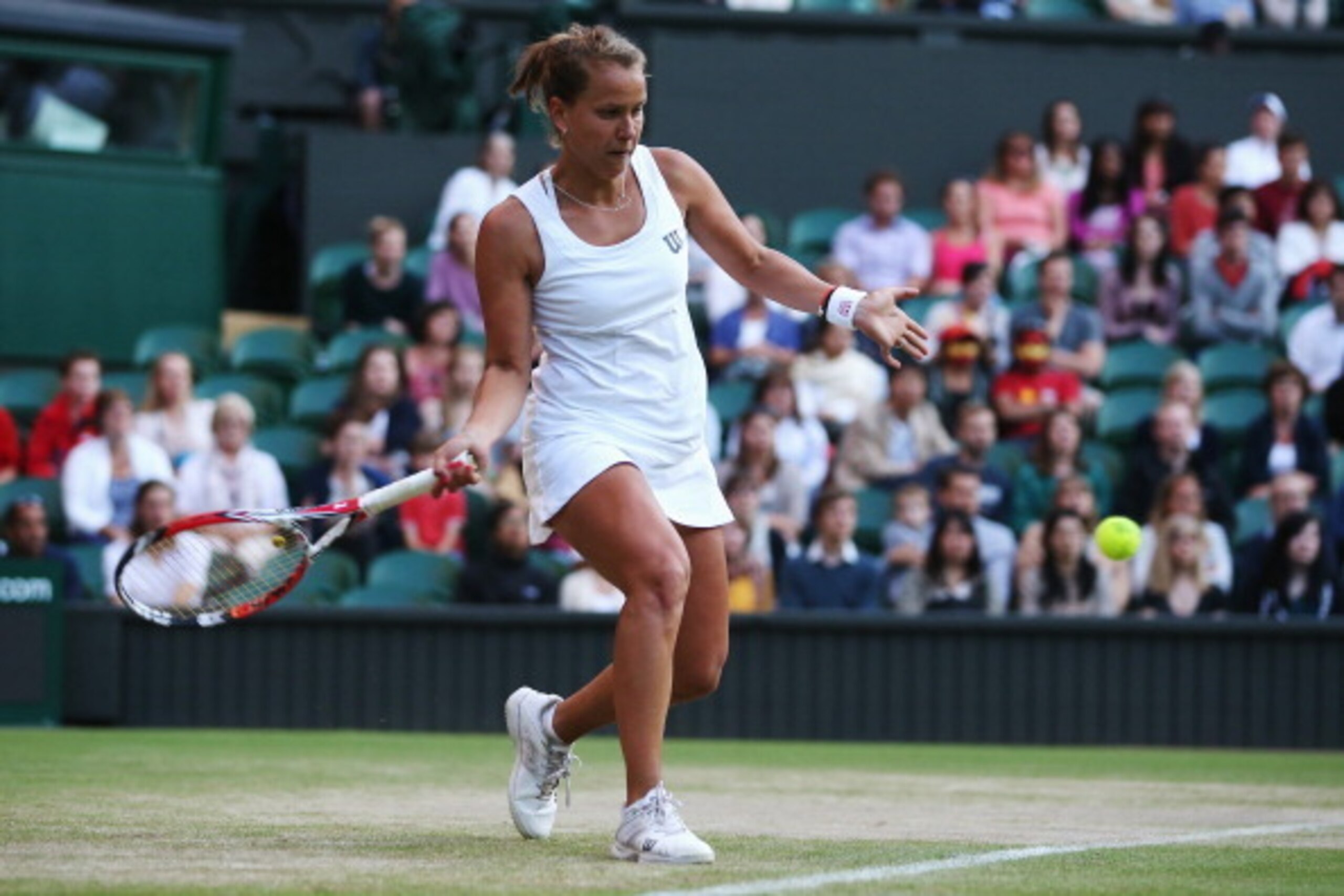 Barbora Zahlavova Strycova hits a forehand during her quarterfinal match at Wimbledon.
