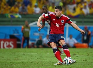 FORTALEZA, BRAZIL - JULY 04:  James Rodriguez of Colombia shoots and scores his team's first goal on a penalty kick during the 2014 FIFA World Cup Brazil Quarter Final match between Brazil and Colombia at Castelao on July 4, 2014 in Fortaleza, Brazil.  (P