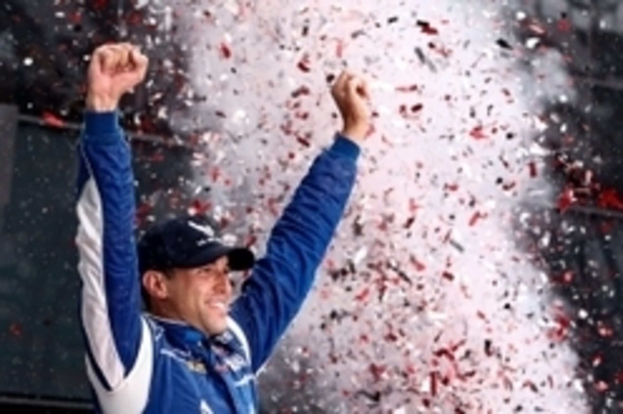 Aric Almirola celebrates after being declared the victor in the rain-shortened Coke Zero 400 at Daytona.