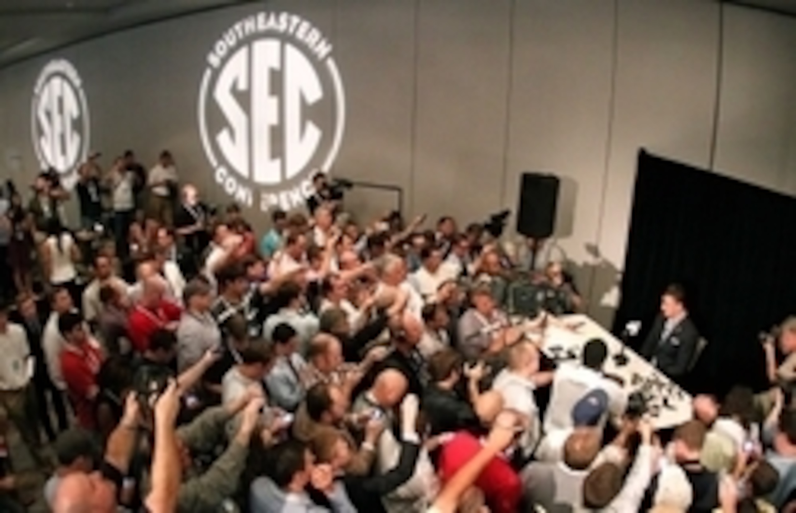 Jul 17, 2013; Hoover, AL, USA; Texas A&M Aggies quarterback Johnny Manziel talks with the media during the 2013 SEC football media days at the Hyatt Regency. Mandatory Credit: Marvin Gentry-USA TODAY Sports