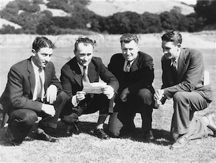 Strader is third from the left.