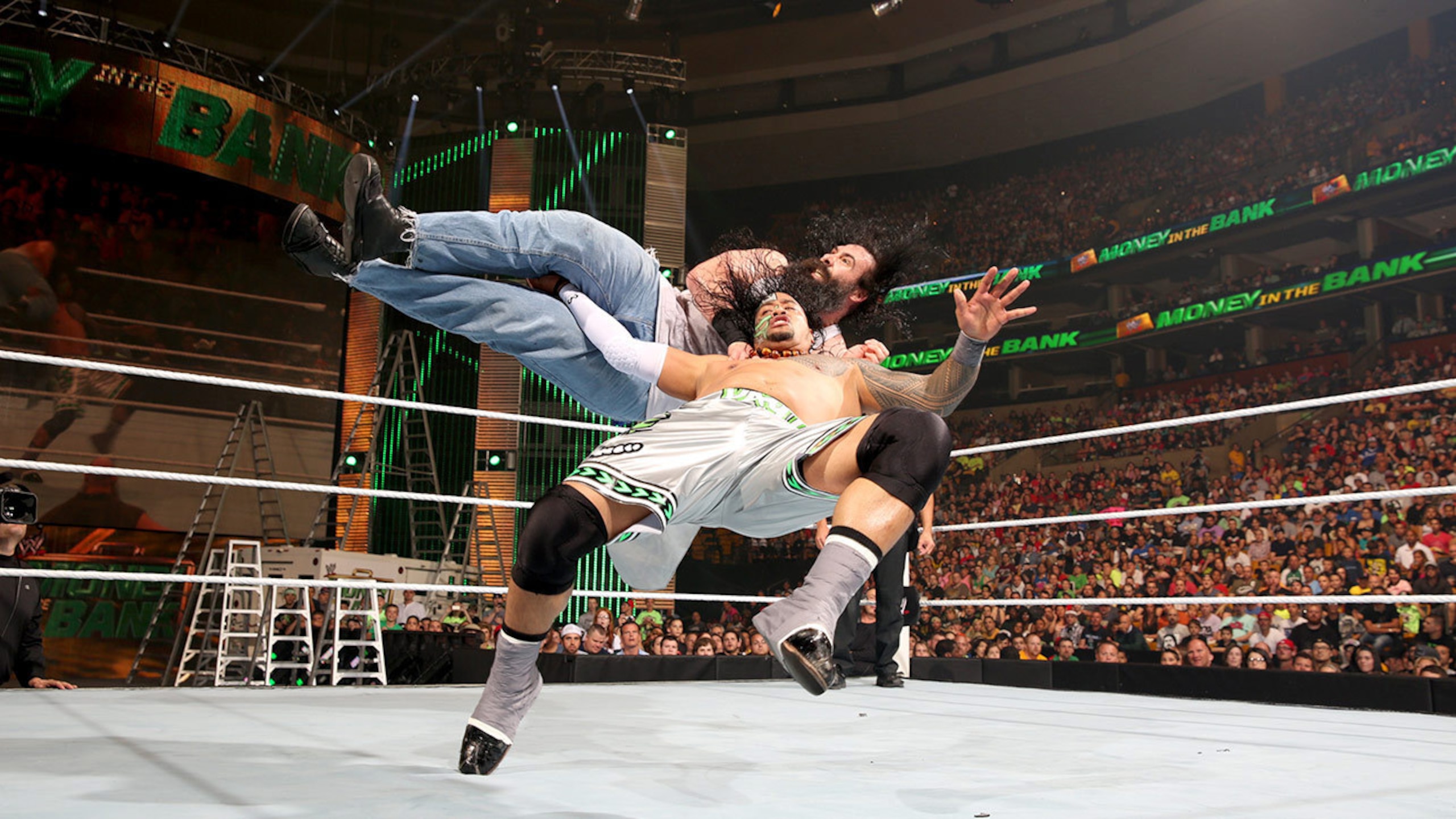 Luke Harper takes a ride to the canvas courtesy of a Samoan Drop.