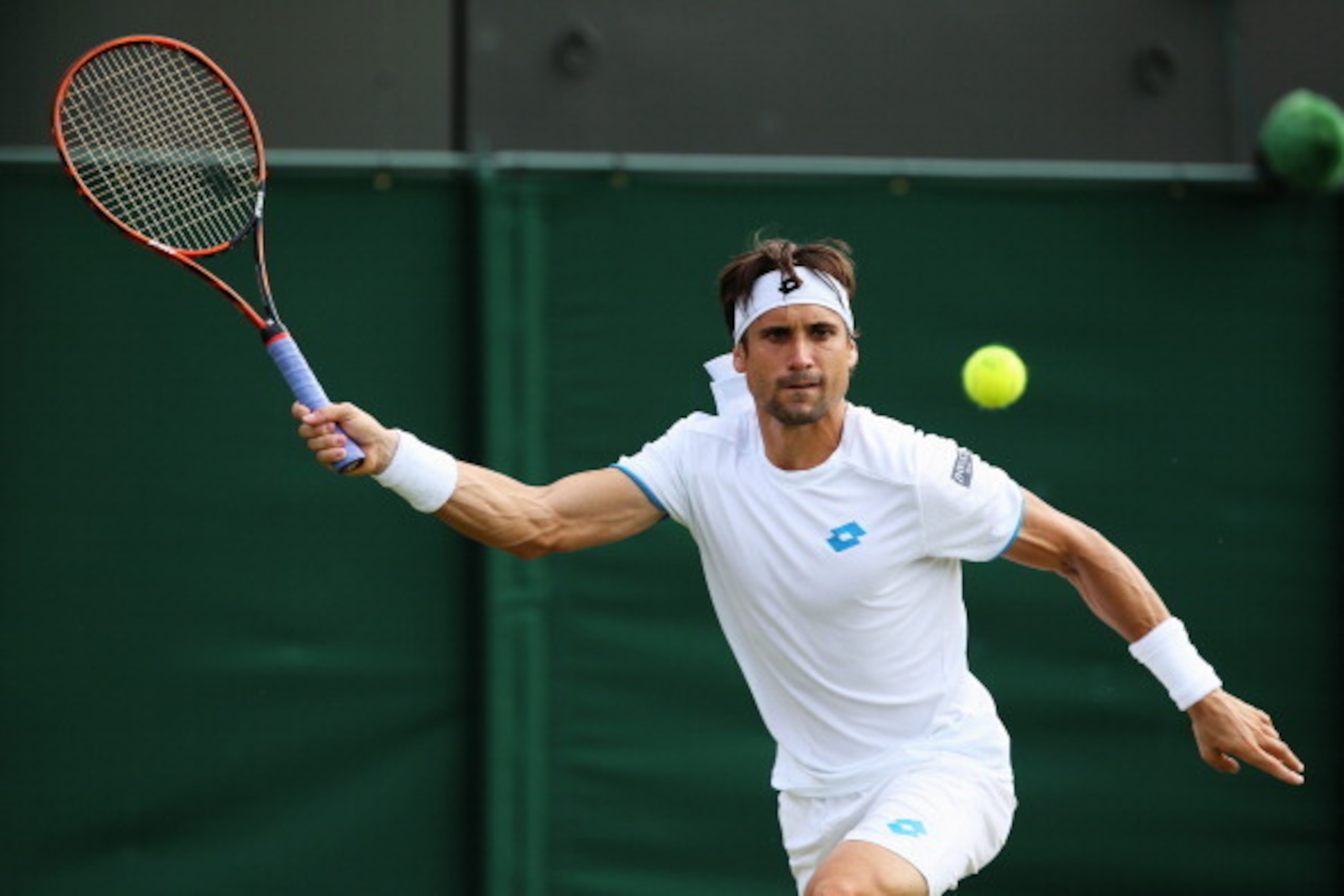 David Ferrer eyes the ball during a Wimbledon match.