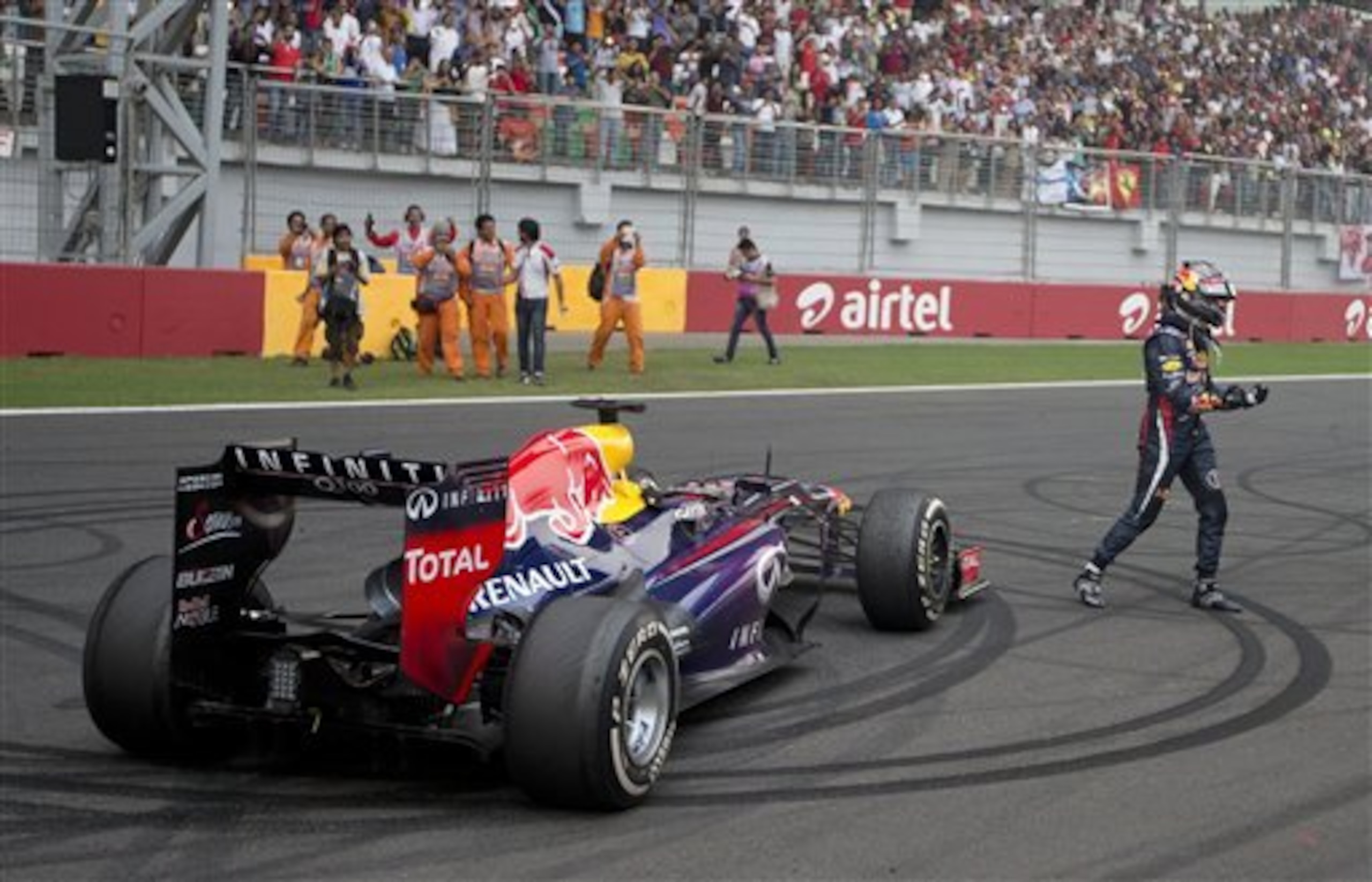 Vettel celebrating his fourth-straight championship in 2013.