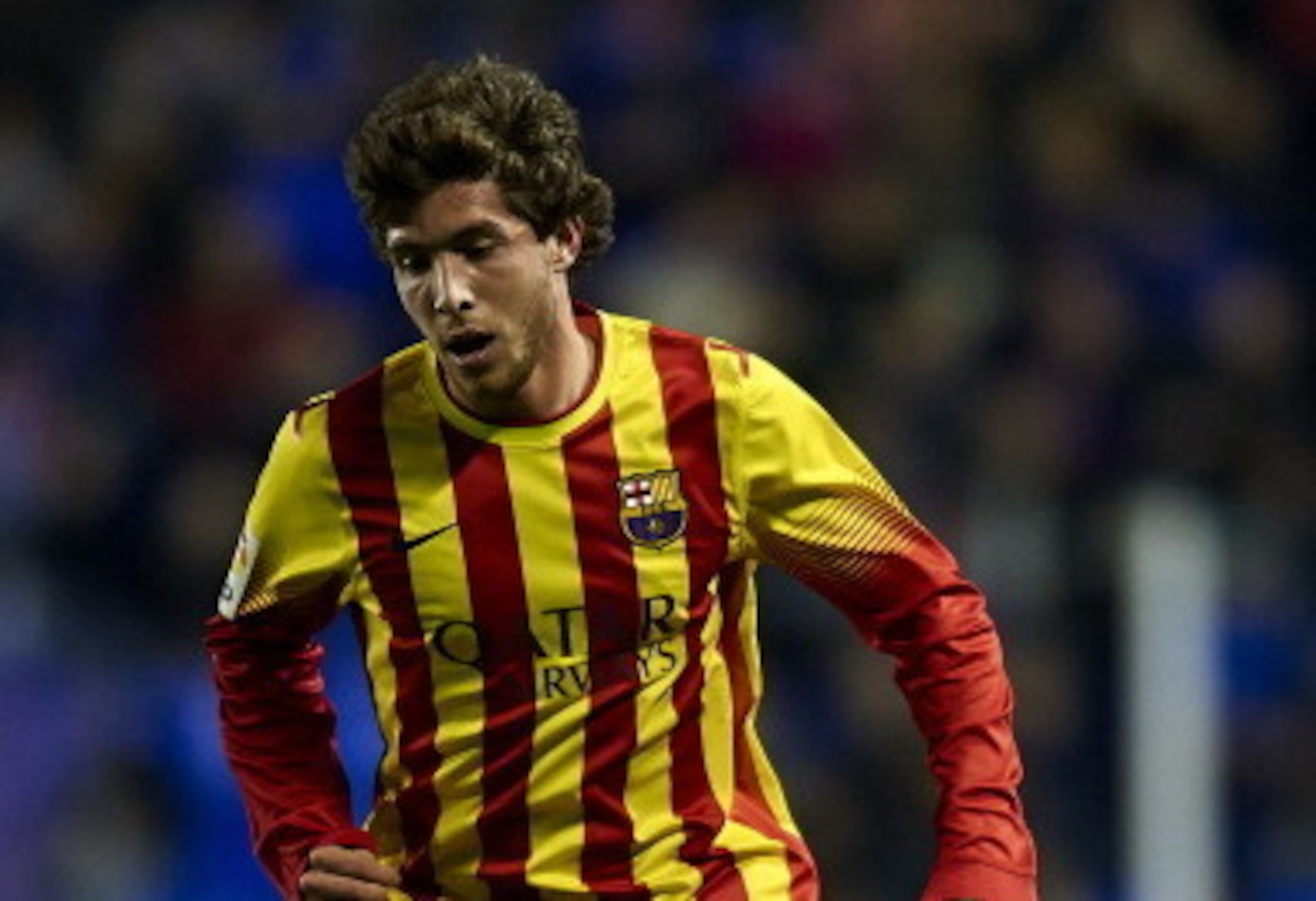 VALENCIA, SPAIN - JANUARY 22:  Sergi Roberto of Barcelona runs with the ball during the Copa del Rey Quarter Final First Leg match between Levante UD and FC Barcelona at Ciutat de Valencia on January 22, 2014 in Valencia, Spain.  (Photo by Manuel Queimade