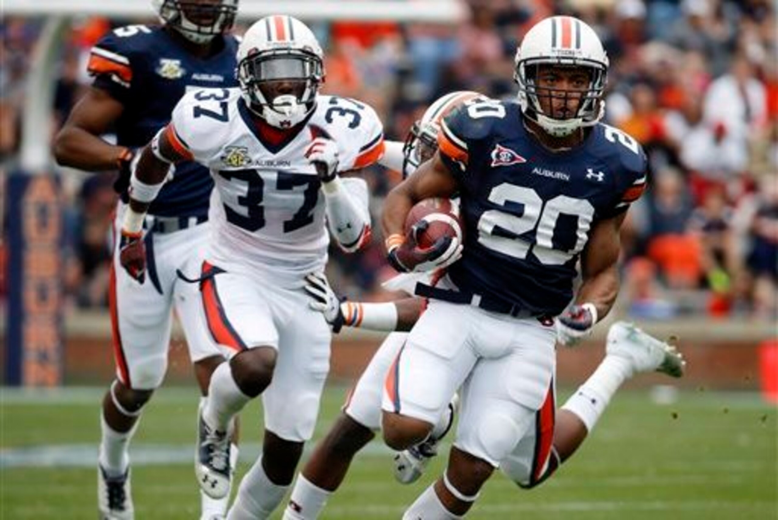 DB Kamryn Melton and RB Corey Grant