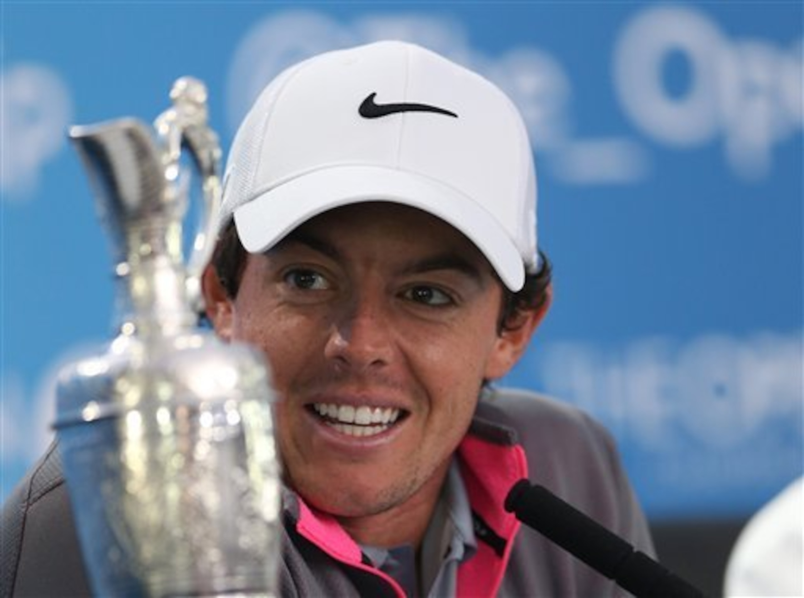 Smiles all around for Rory McIlroy after winning the British Open.