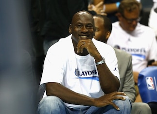 Michael Jordan doesn't just own a winning smile. He owns the Charlotte Hornets.