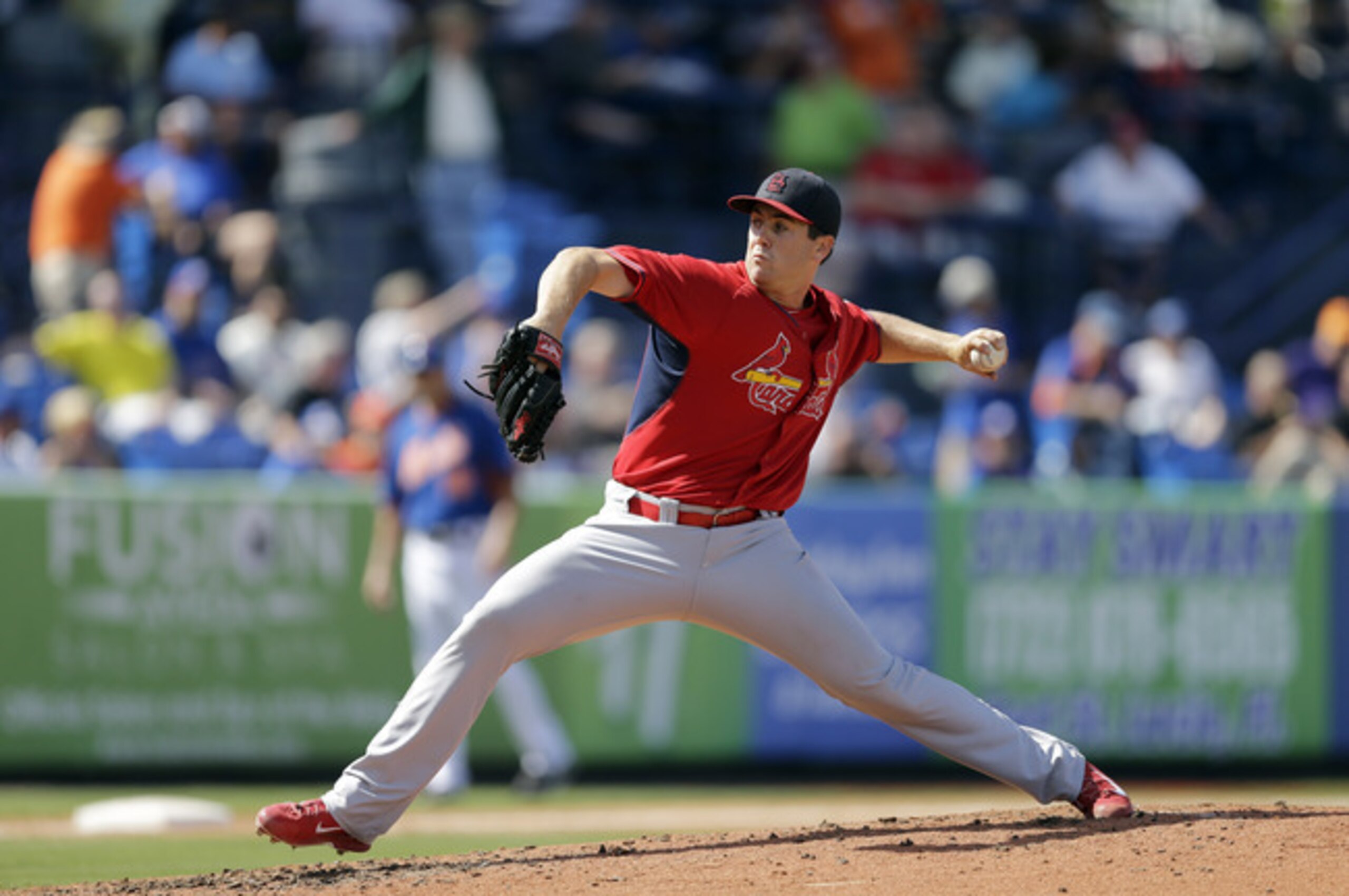 Tim Cooney throws a pitch during a spring training game against the Mets on March 7.
