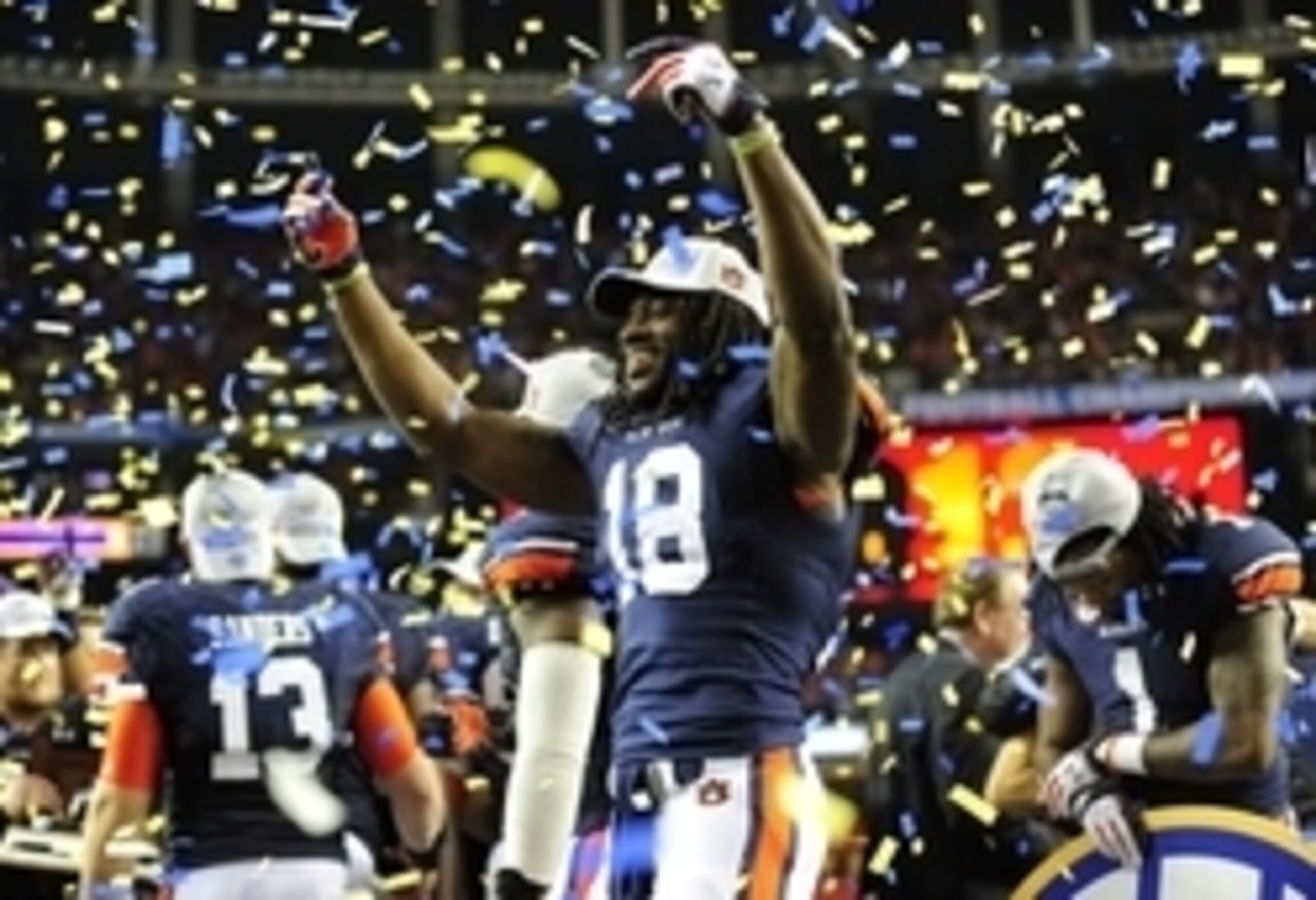 Dec 7, 2013; Atlanta, GA, USA; Auburn Tigers wide receiver Sammie Coates (18) celebrates after the 2013 SEC Championship game against the Missouri Tigers at Georgia Dome. The Auburn Tigers defeated the Missouri Tigers 59-42.  Mandatory Credit: Kevin Liles
