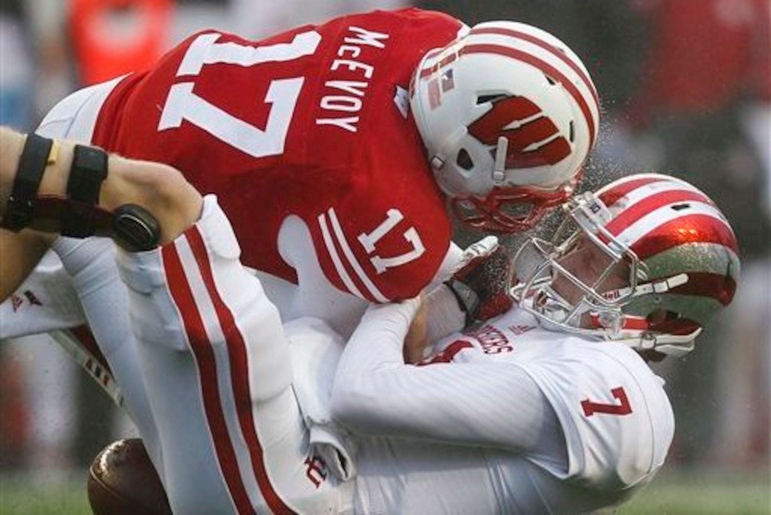 Last year's starting safety Tanner McEvoy has a dogfight ahead of him for the starting quarterback spot.