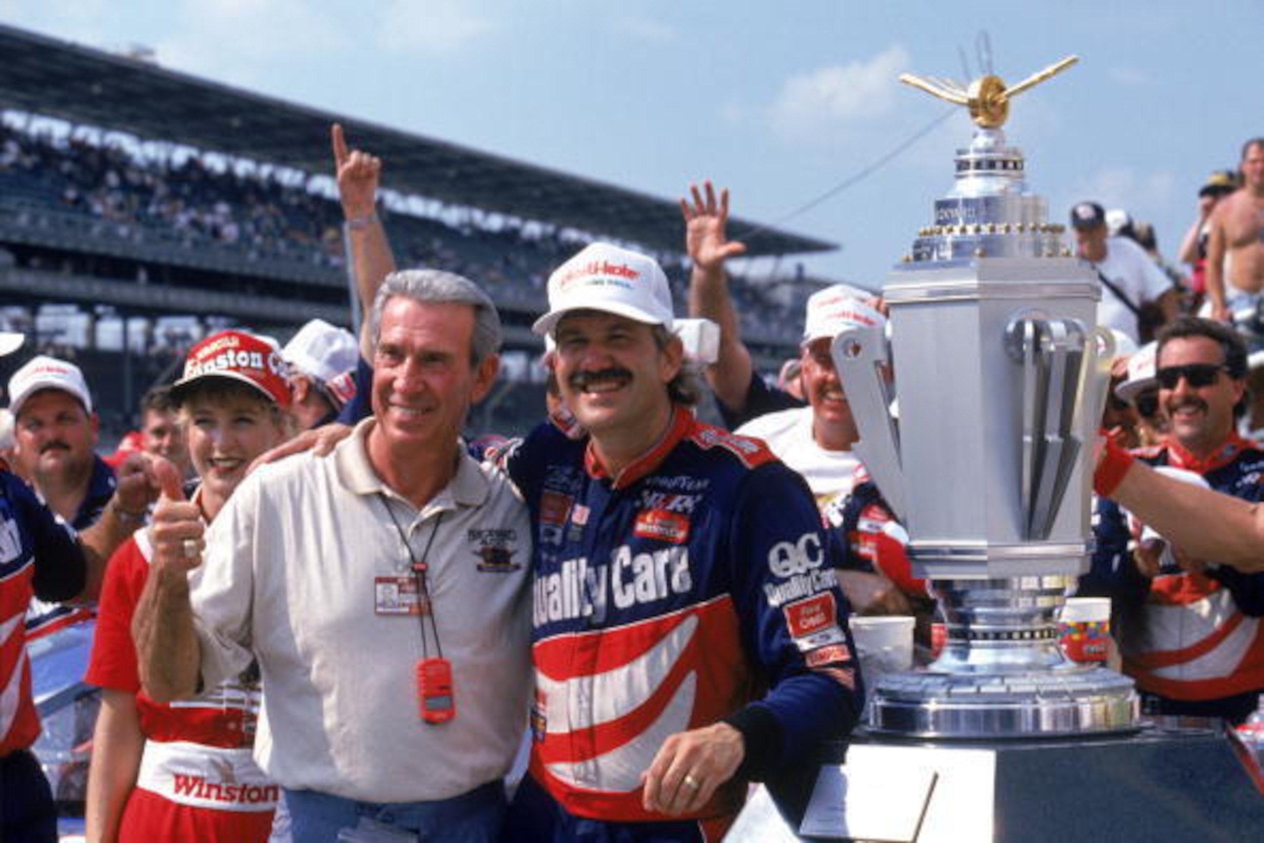 Dale Jarrett (right) poses with his father, Ned, and the winning trophy after capturing the 1996 Brickyard. Dale Jarrett (right) poses with his father, Ned, and the winning trophy after capturing the 1996 Brickyard.