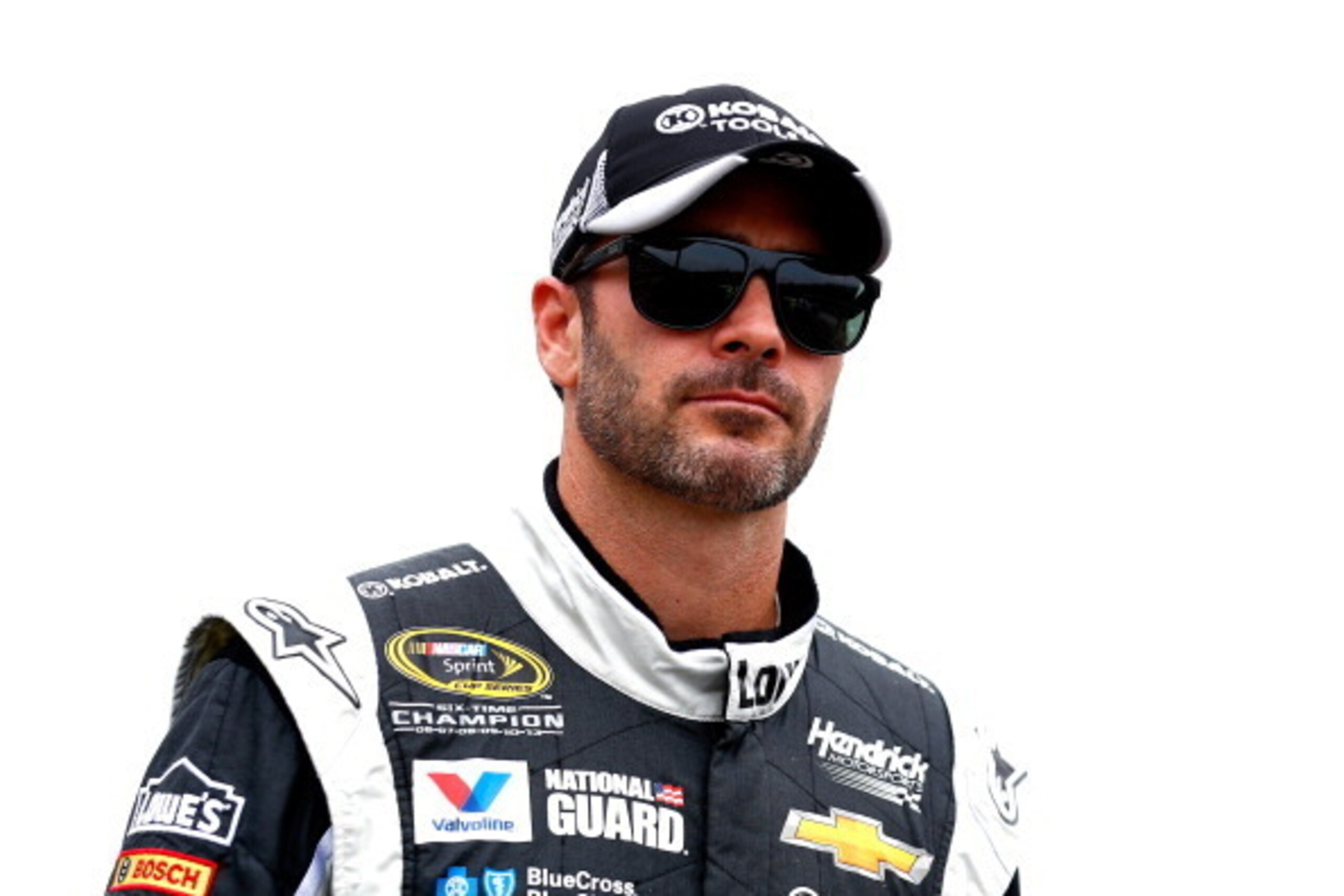 INDIANAPOLIS, IN - JULY 26:  Jimmie Johnson, driver of the #48 Lowe's / Kobalt Tools Chevrolet, looks on from the grid during qualifying for the NASCAR Sprint Cup Series Crown Royal Presents The John Wayne Walding 400 at the Brickyard Indianapolis Motor S