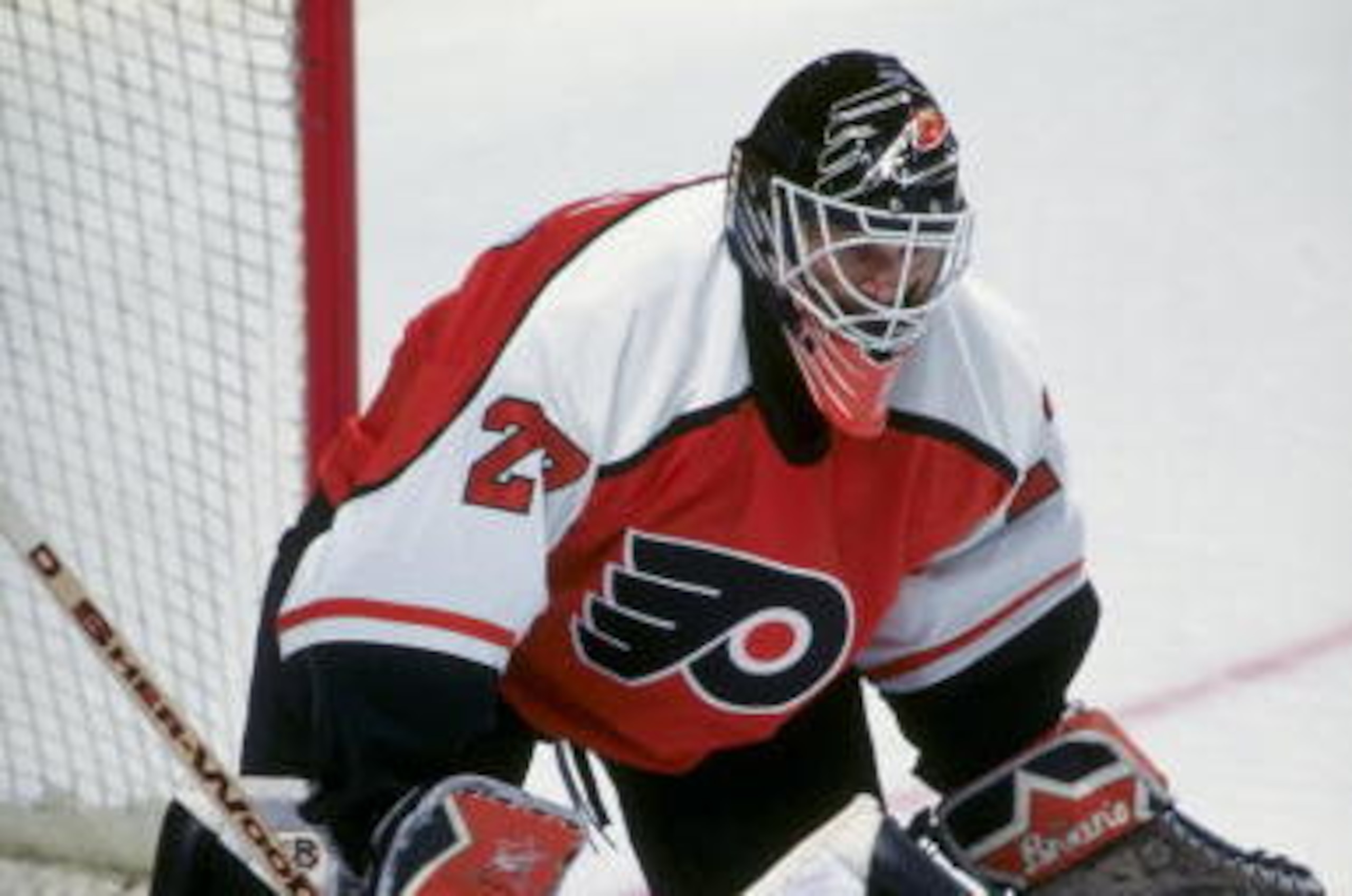 22 Aug 1998: Ron Hextall #27 of the Philadelphia Flyers guards the goal box during the game against the Montreal Canadiens at the Molson Centre in Montreal, Canada. The Flyers defeated the Canadiens 7-1. Mandatory Credit: Steve Babineau  /Allsport