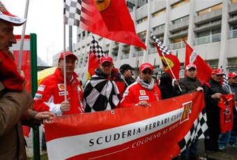 Fans show their support for Schumacher outside the hospital where he was being treated.