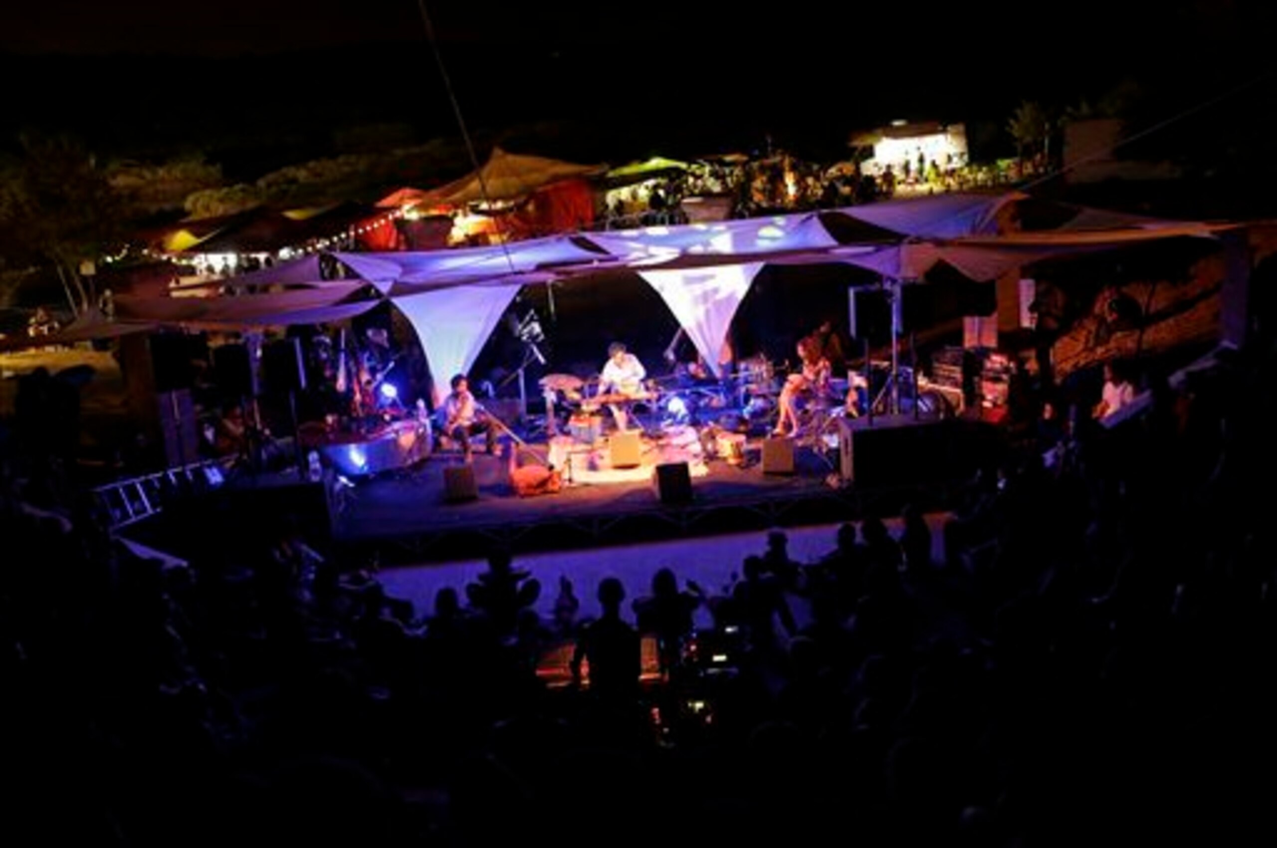 Portuguese band Khayalan Trio performs on the stage during a didgeridoo music festival in Sitio das Fontes, near Estombar, southern Portugal, Friday, Aug. 15, 2014. Musicians from Japan, Australia, Spain, France and Portugal perform during the three days 