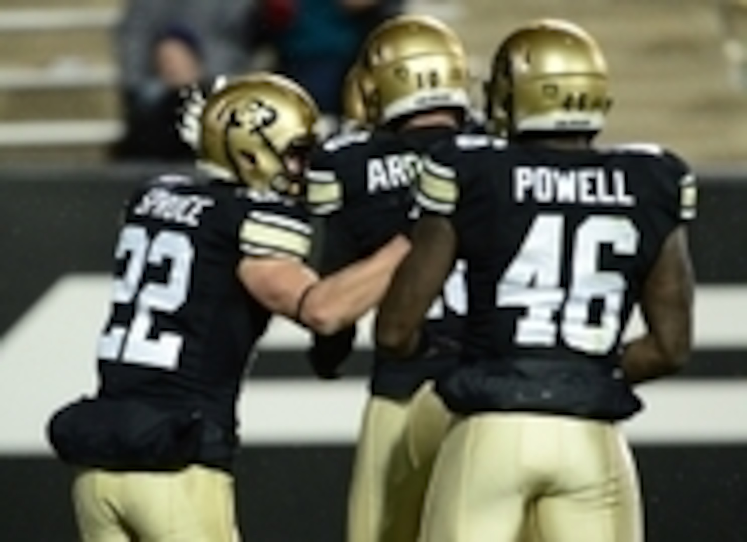 RB Christian Powell celebrates with teammates.