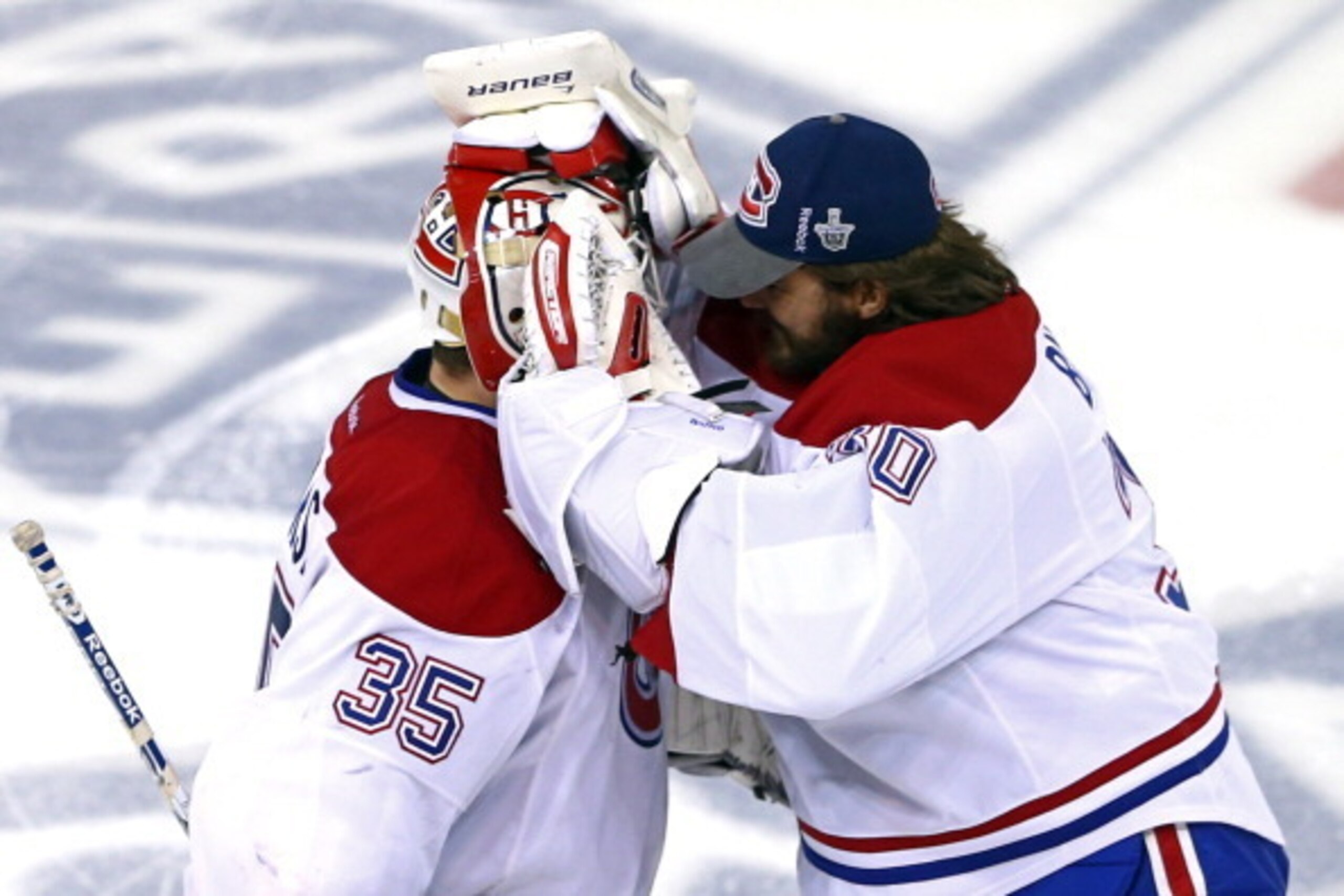 Peter Budaj (right) congratulates Dustin Tokarski.