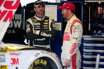 Dale Earnhardt Jr. (right) with teammate Jimmie Johnson