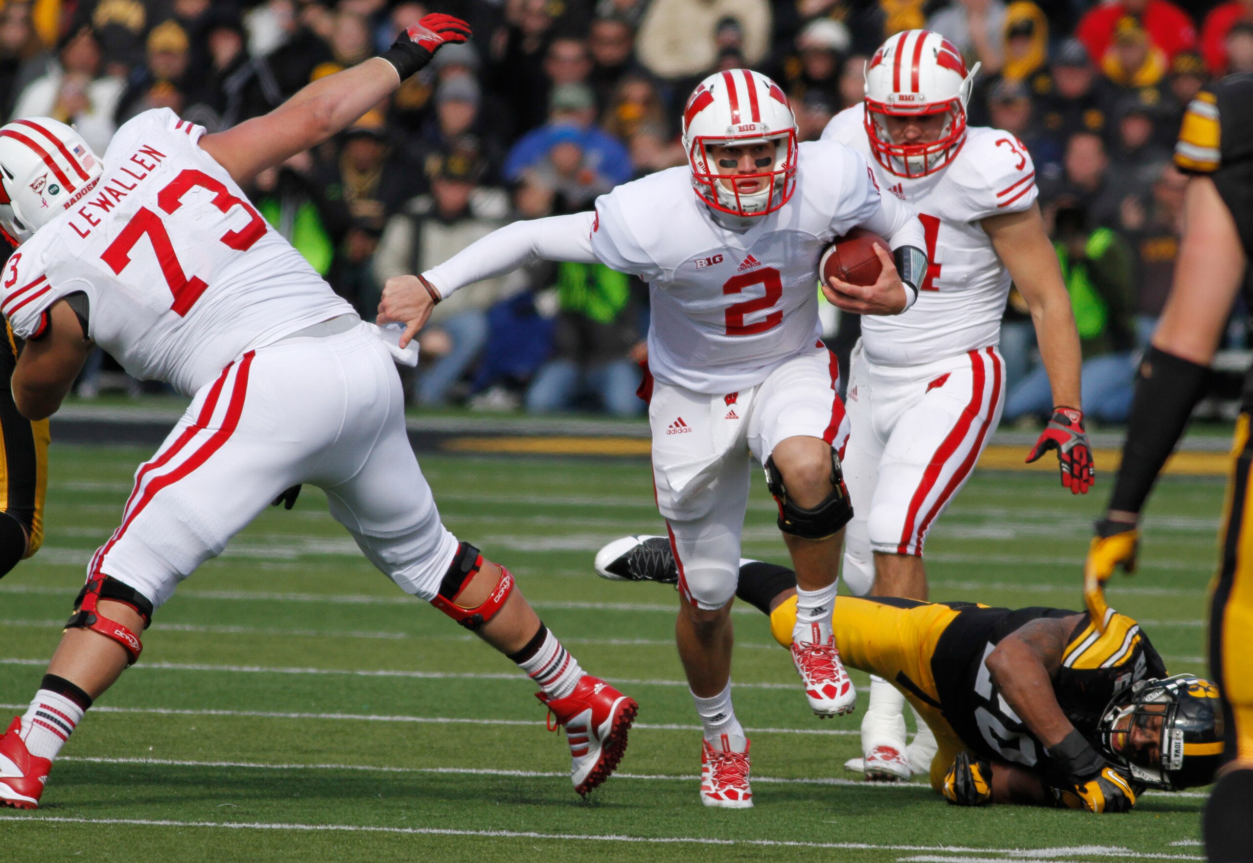 Joel Stave and Tanner McEvoy are running alongside one another for the starting quarterback slot. Joel Stave and Tanner McEvoy are running alongside one another for the starting quarterback slot.