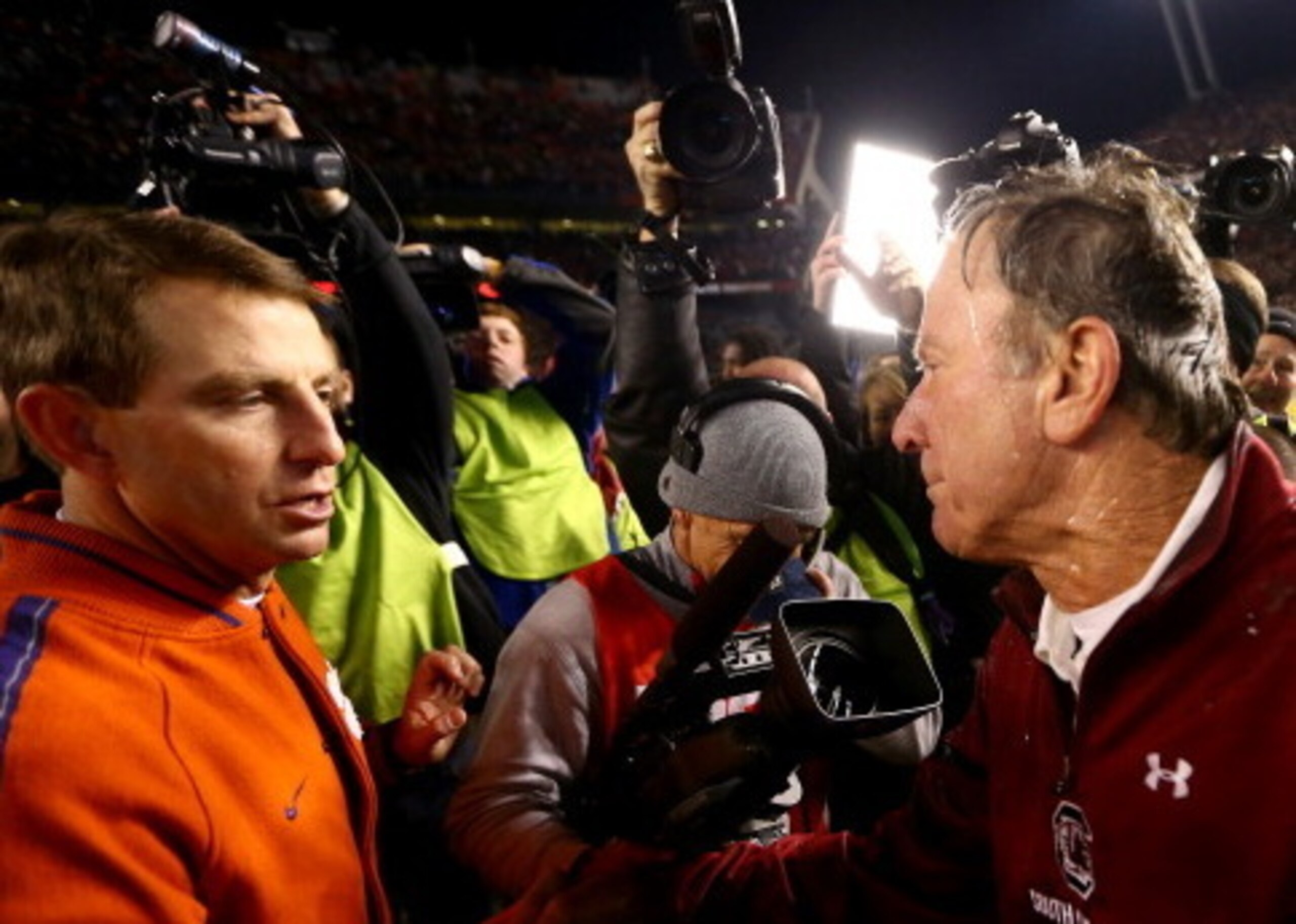 Clemson coach Dabo Swinney and South Carolina coach Steve Spurrier after another Gamecocks win