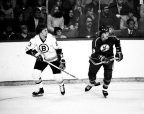 Al Sims played for the Bruins before coaching the Sharks.