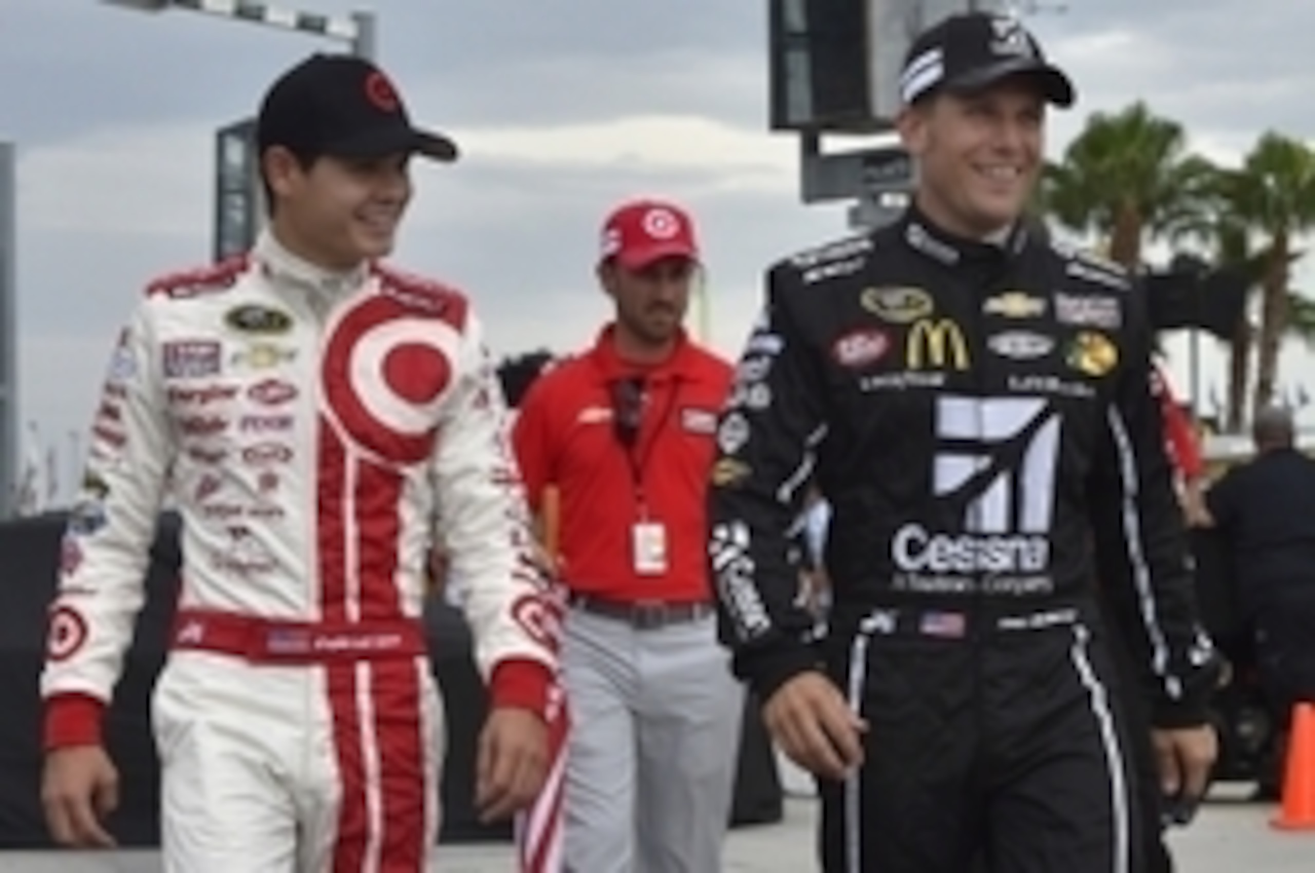 Teammates Kyle Larson (left) and Jamie McMurray.