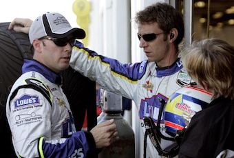 Marc Goossens (right) with teammate Jimmie Johnson at Rolex 24 at Daytona January 2007.