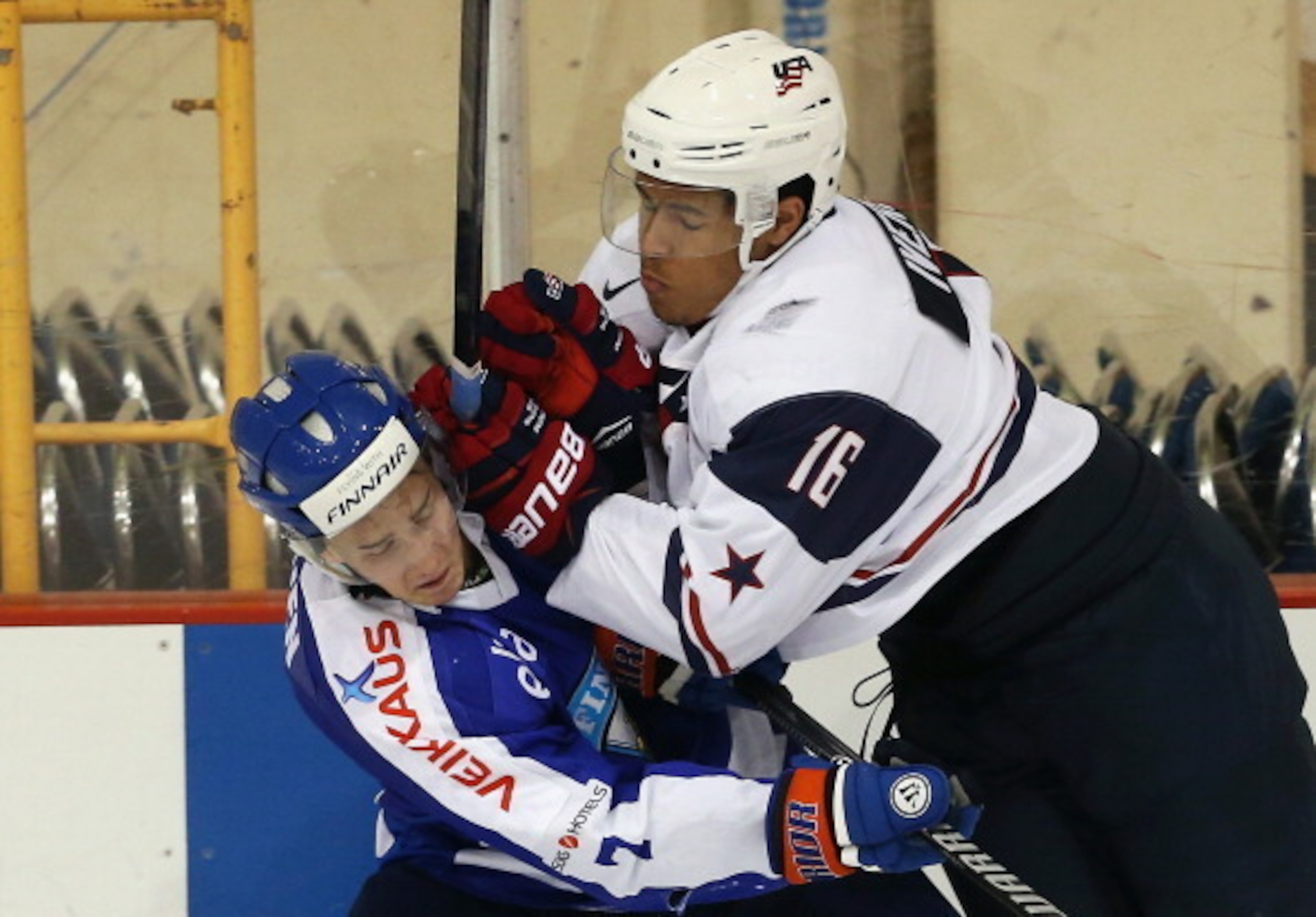 Iverson imposes his will on a Finnish player.