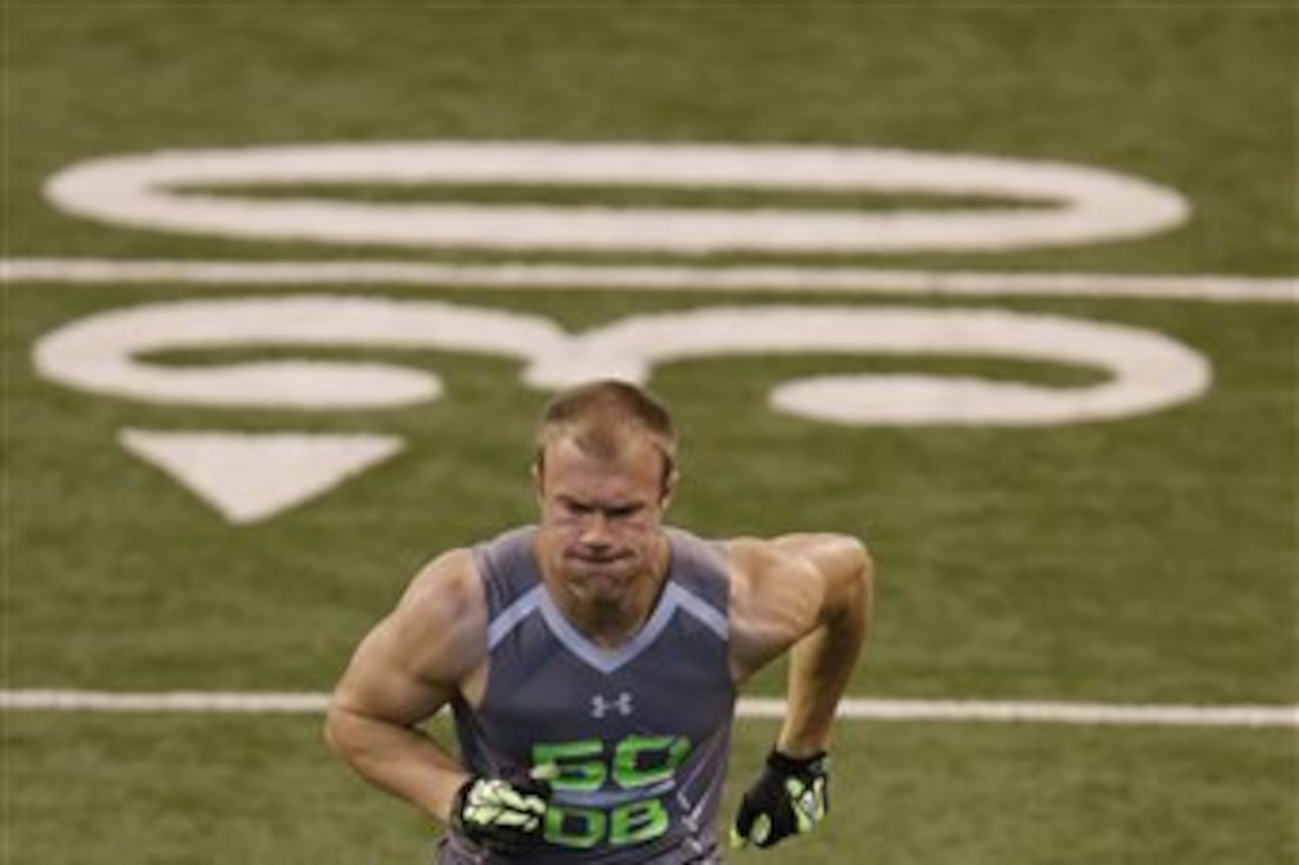 Brigham Young defensive back Daniel Sorensen runs a drill at the NFL football scouting combine in Indianapolis, Tuesday, Feb. 25, 2014. (AP Photo/Michael Conroy)
