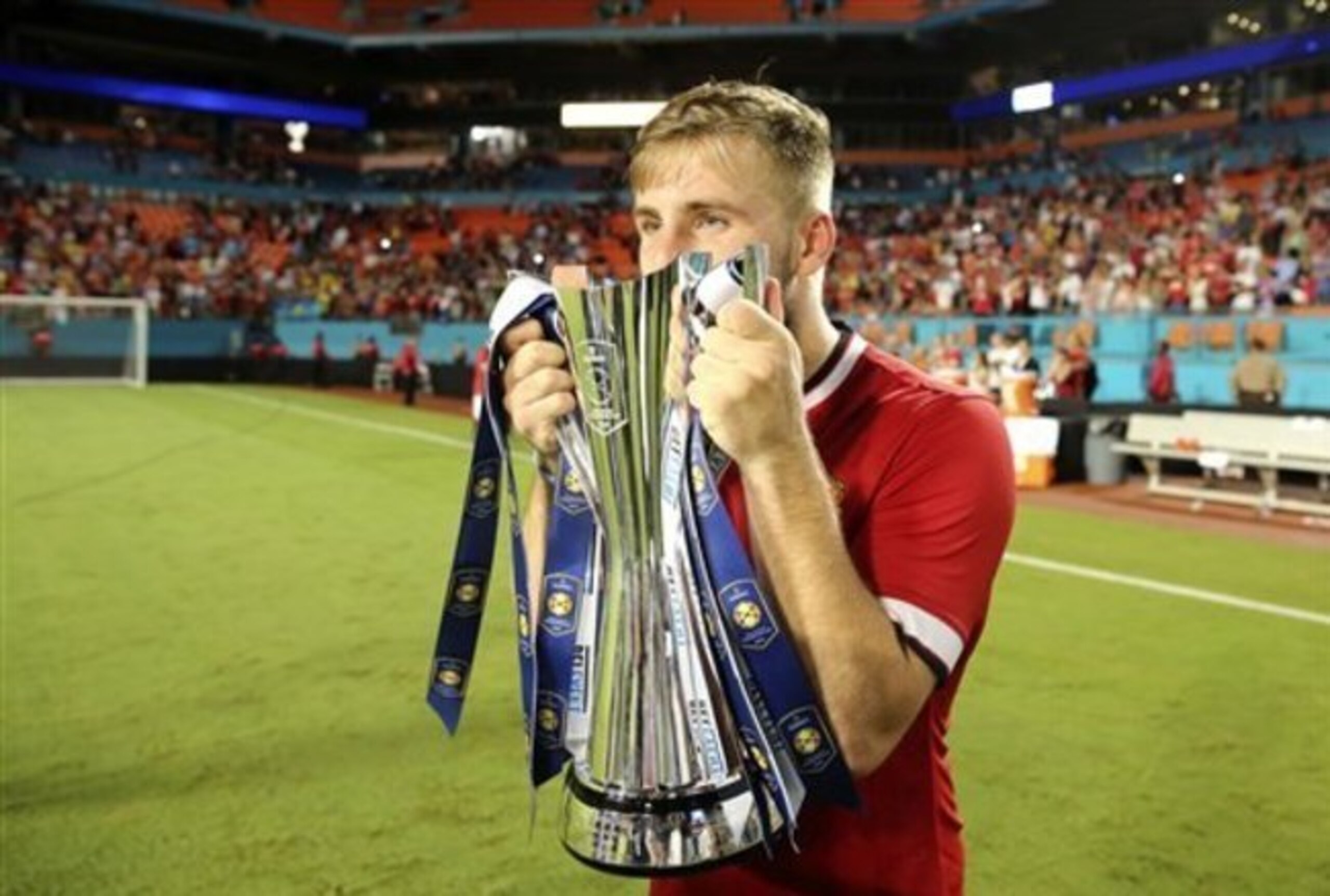 Luke Shaw has already tasted success with Manchester United but now must watch from the wings.