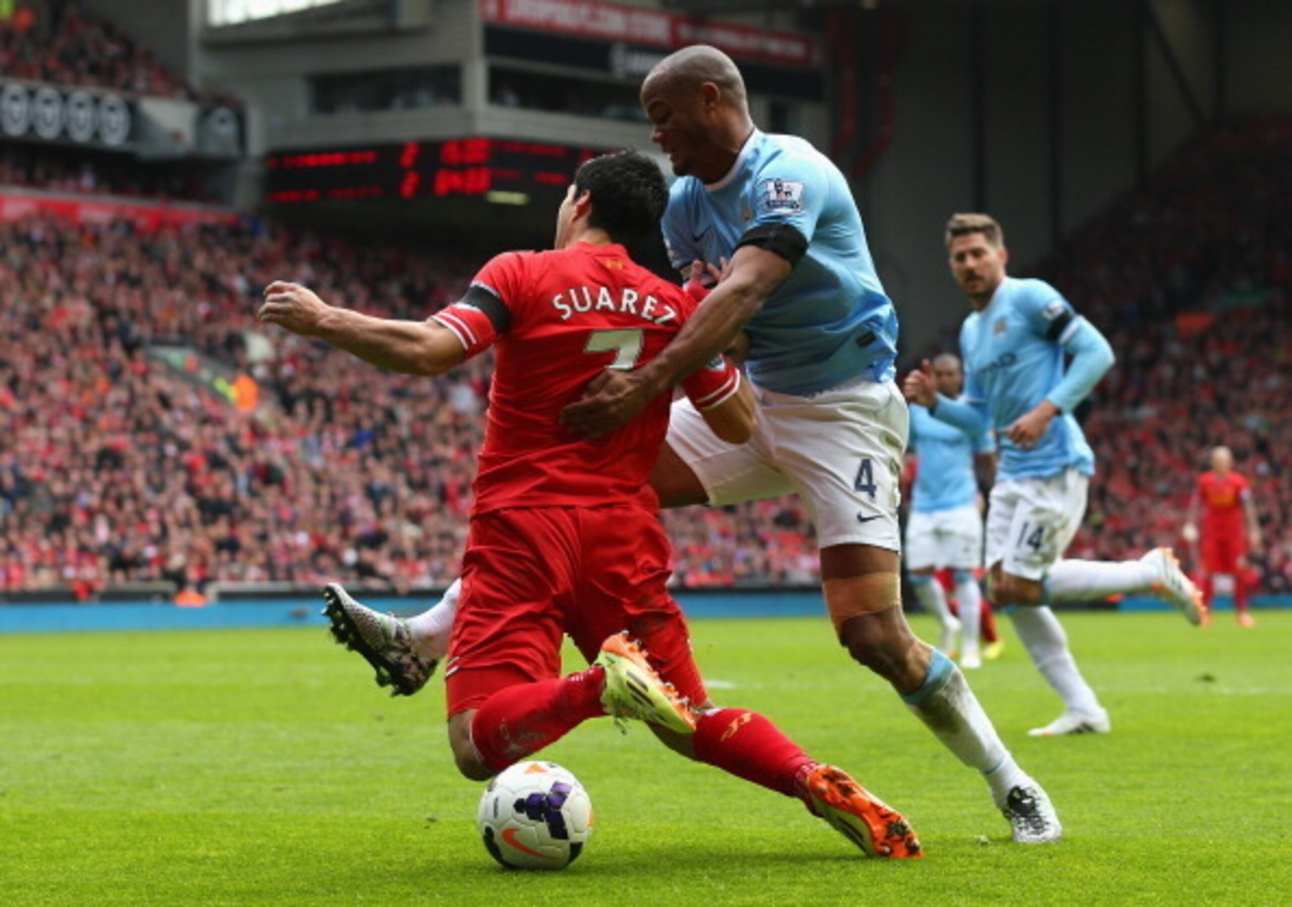 Kompany probably isn't too unhappy to see Suarez out of the Premier League.