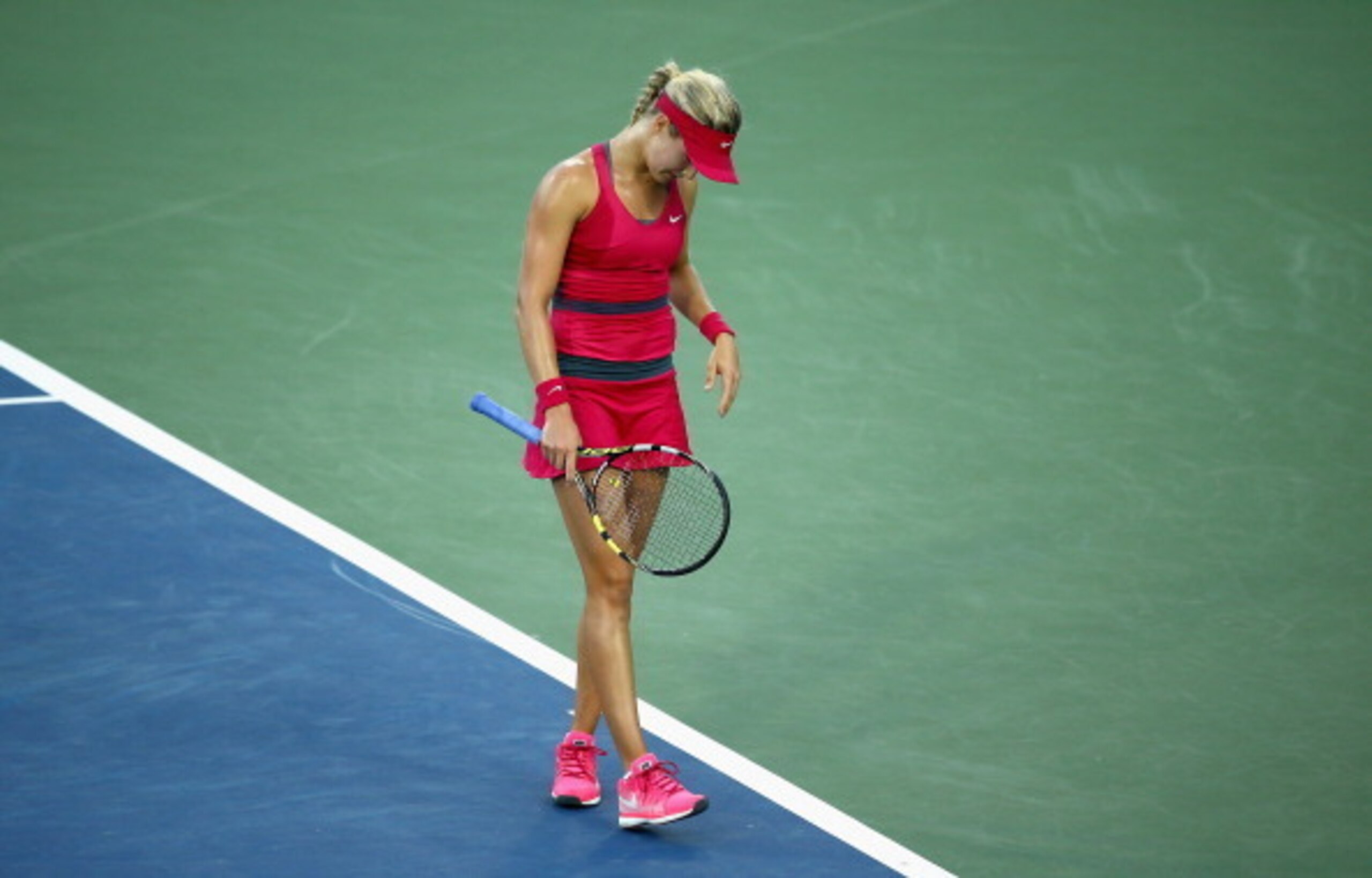CINCINNATI, OH - AUGUST 13:  Eugenie Bouchard of Canada looks downward after losing a point during her match against Svetlana Kuznetsova on day 5 at Western & Southern Open on August 13, 2014 at the Linder Family Tennis Center in Cincinnati,Ohio  (Photo b