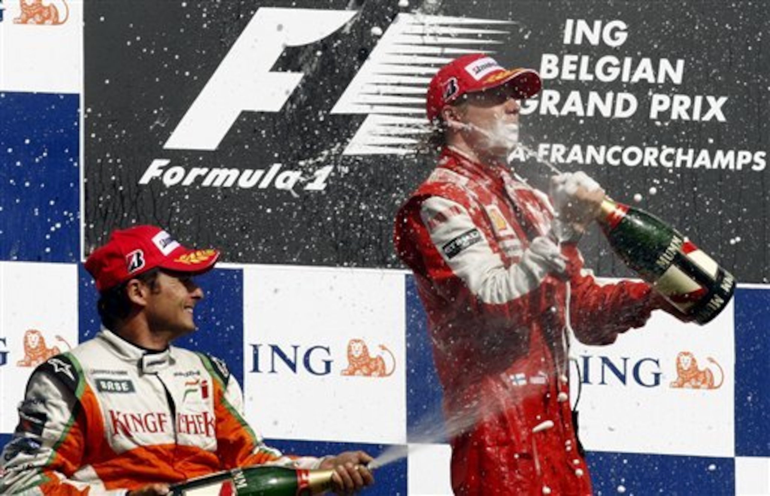 Kimi Raikkonen celebrates his victory at the 2009 Belgian Grand Prix.