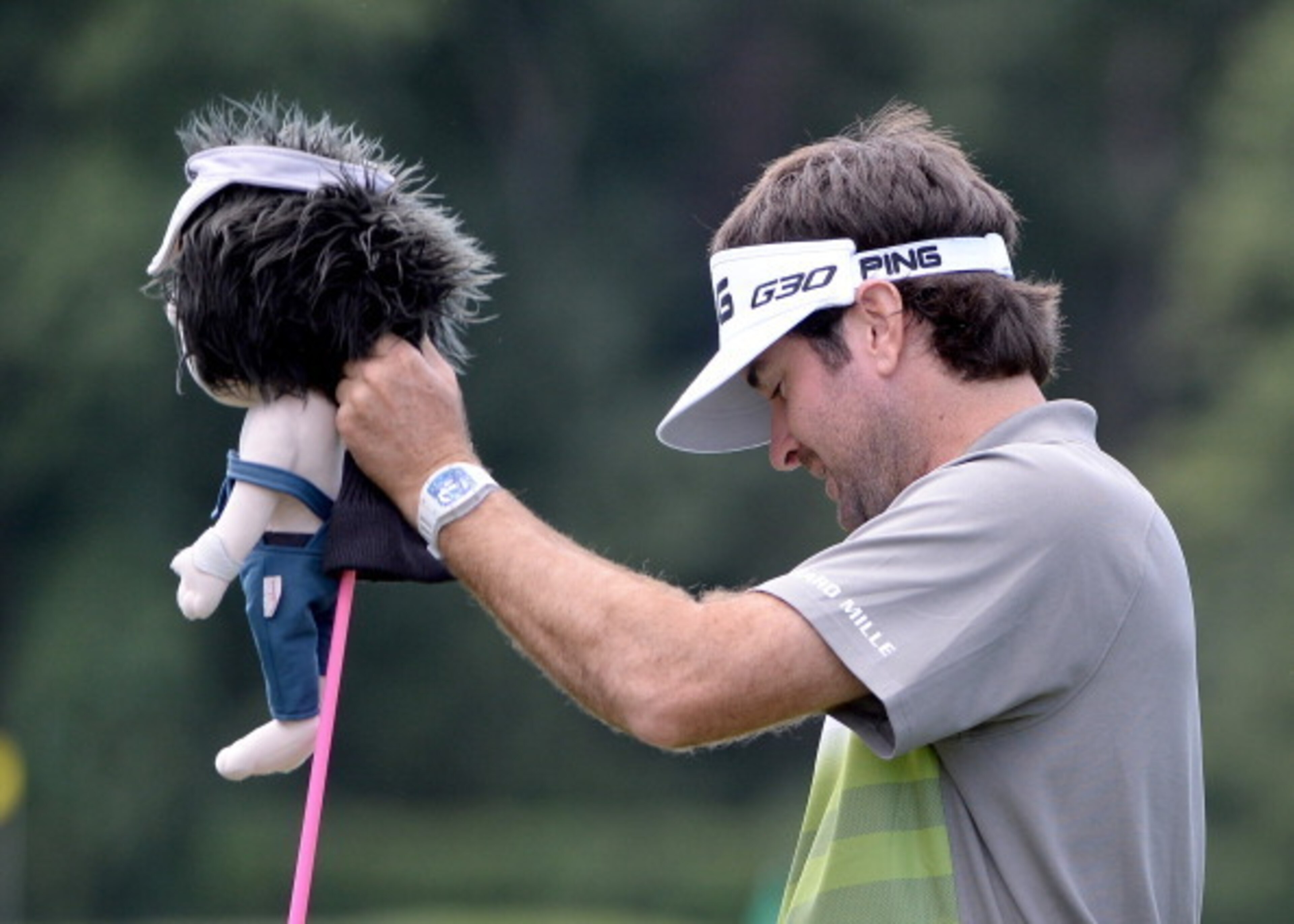 Bubba Watson and his head cover are on a downward slide.