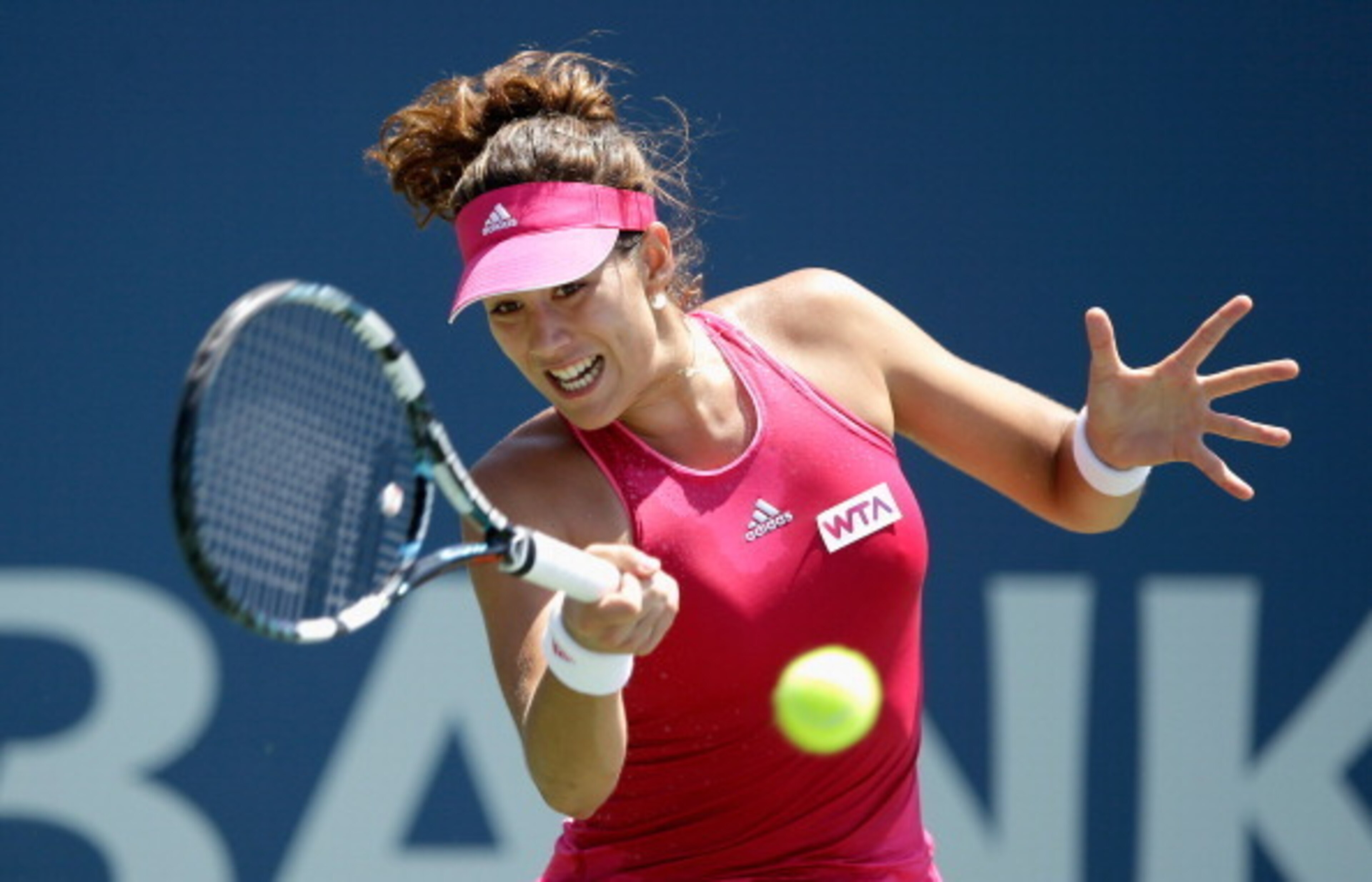 Garbine Muguruza hits a forehand during a match at the 2014 Bank of the West Classic in Stanford.