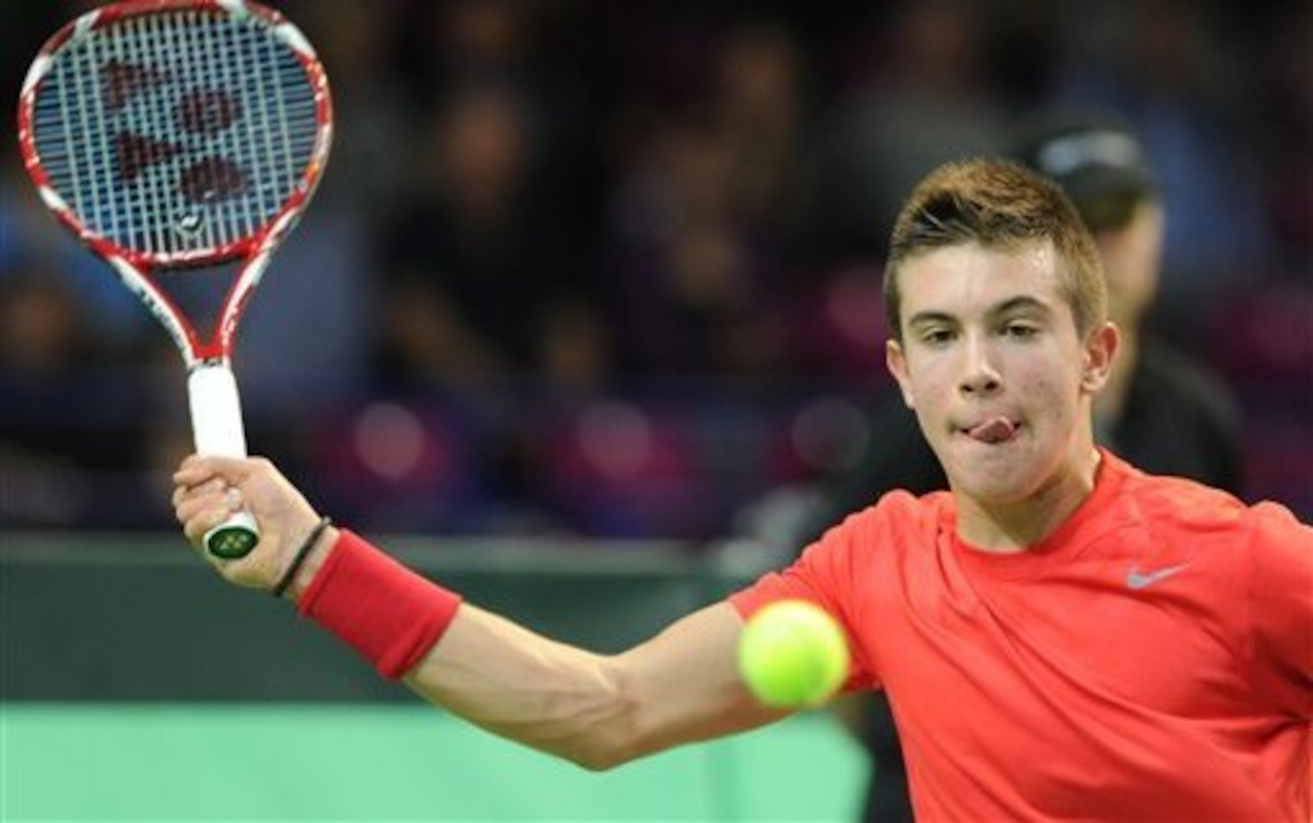 Borna Coric, 17, prepares to hit a forehand during a Davis Cup match against Jerzy Janowicz.
