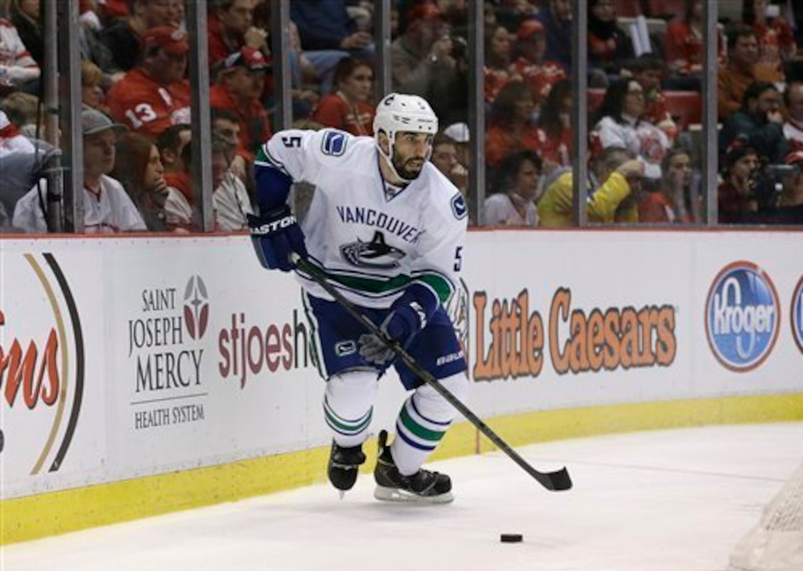 Jason Garrison provides an upgrade on D and flexibility for the front office.