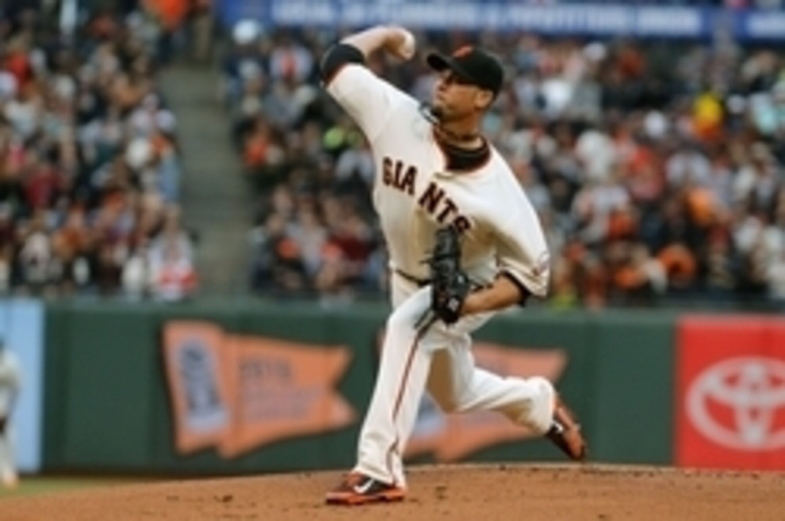 Aug 12, 2014; San Francisco, CA, USA; San Francisco Giants starting pitcher Ryan Vogelsong (32) pitches the ball against the Chicago White Sox during the first inning at AT&T Park. Mandatory Credit: Kelley L Cox-USA TODAY Sports Aug 12, 2014; San Francisco, CA, USA; San Francisco Giants starting pitcher Ryan Vogelsong (32) pitches the ball against the Chicago White Sox during the first inning at AT&T Park. Mandatory Credit: Kelley L Cox-USA TODAY Sports