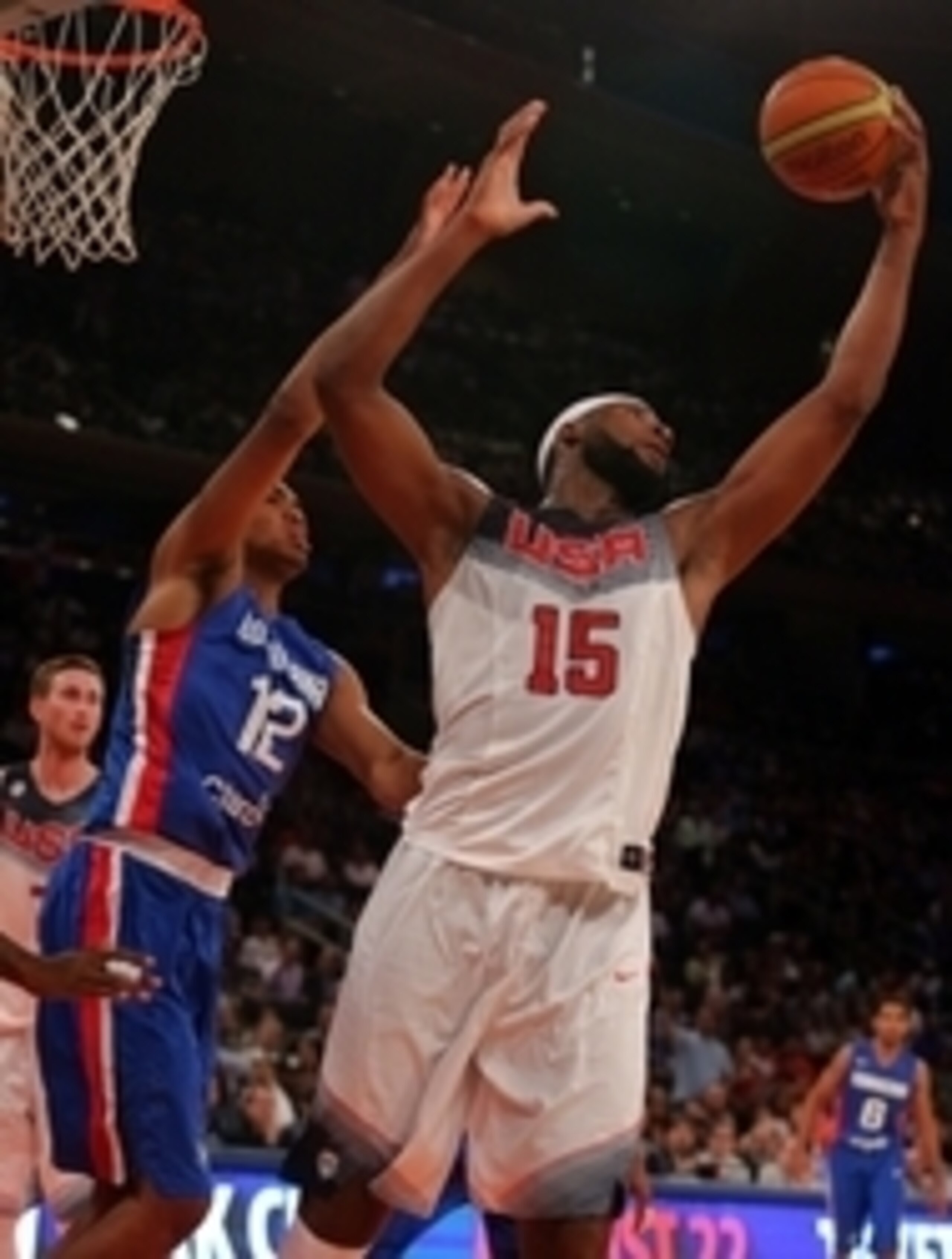 Aug 20, 2014; New York, NY, USA; United States center Andre Drummond (15) grabs a rebound in front of Dominican Republic center Karl Towns (12) during the second half of a game at Madison Square Garden. Mandatory Credit: Brad Penner-USA TODAY Sports