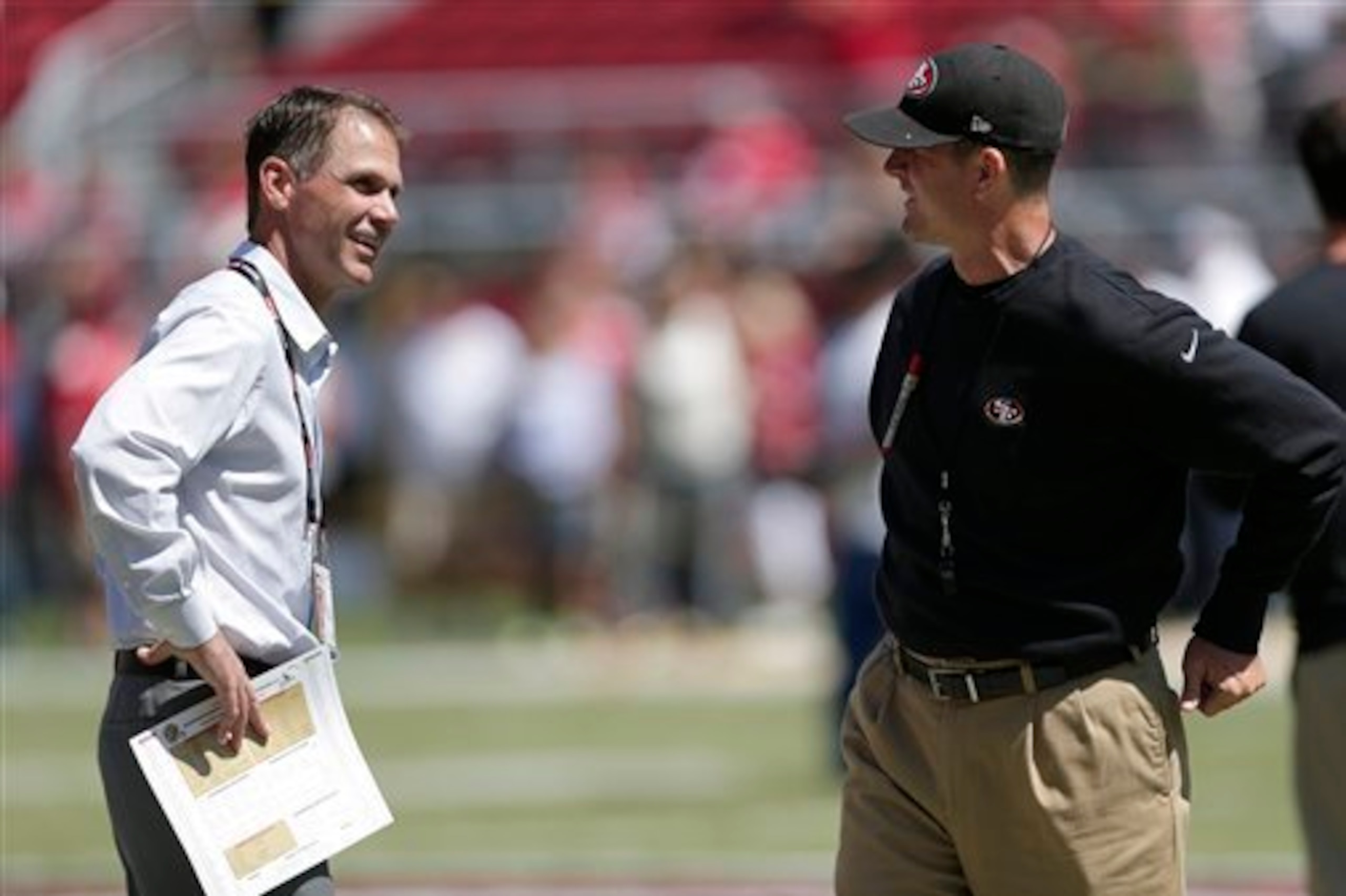 General manager Trent Baalke (left) and head coach Jim Harbaugh (right) will have to trim the 49ers' roster down to 53 players by August 30. General manager Trent Baalke (left) and head coach Jim Harbaugh (right) will have to trim the 49ers' roster down to 53 players by August 30.