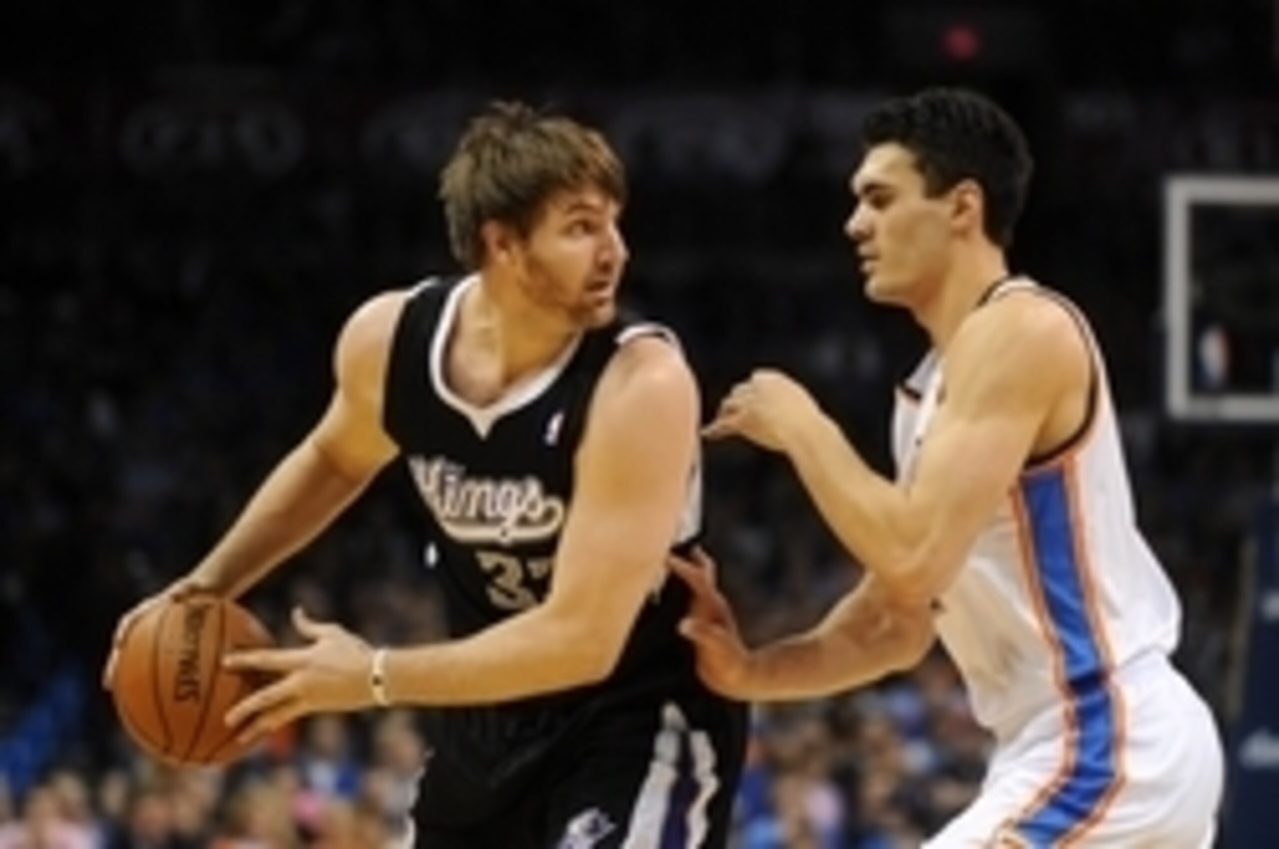 Aaron Gray (left) brings size to the Pistons bench.