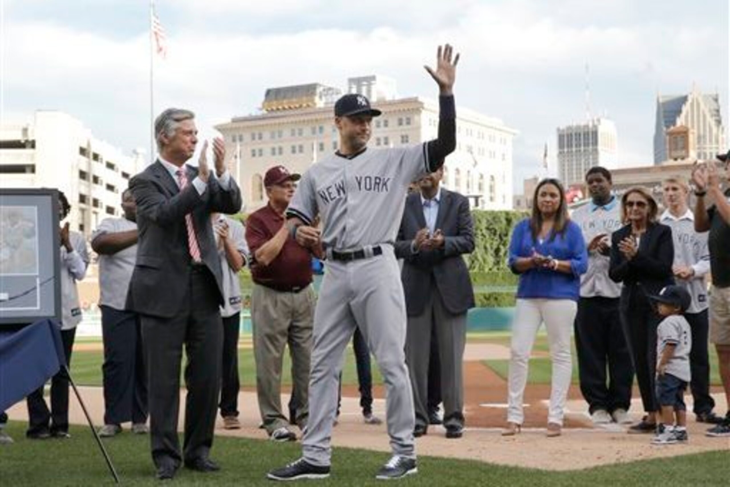 Jeter salutes the crowd during a ceremony at Comerica Park.